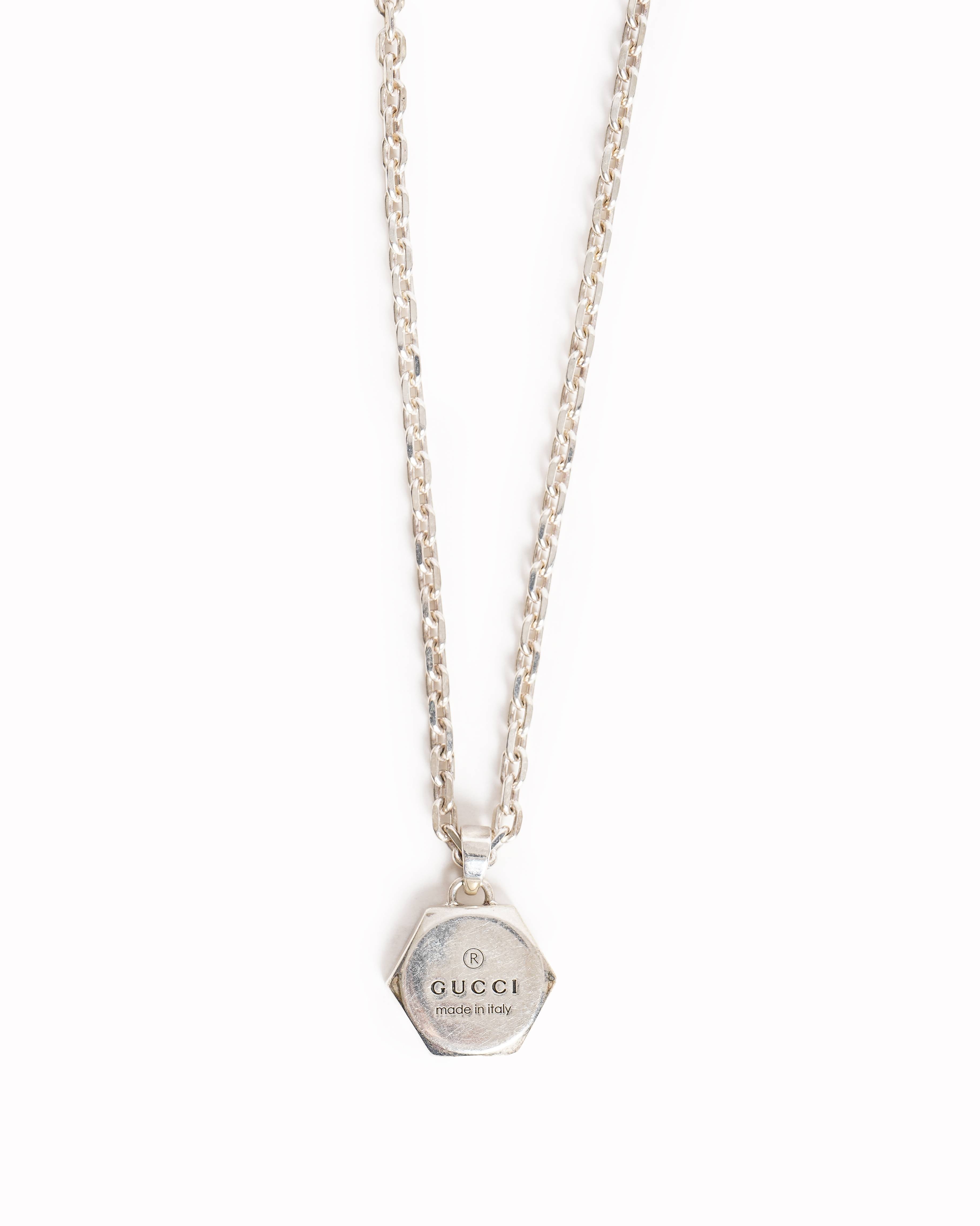 Gucci Silver Hexagonal Pendant Necklace with Logo Engraving