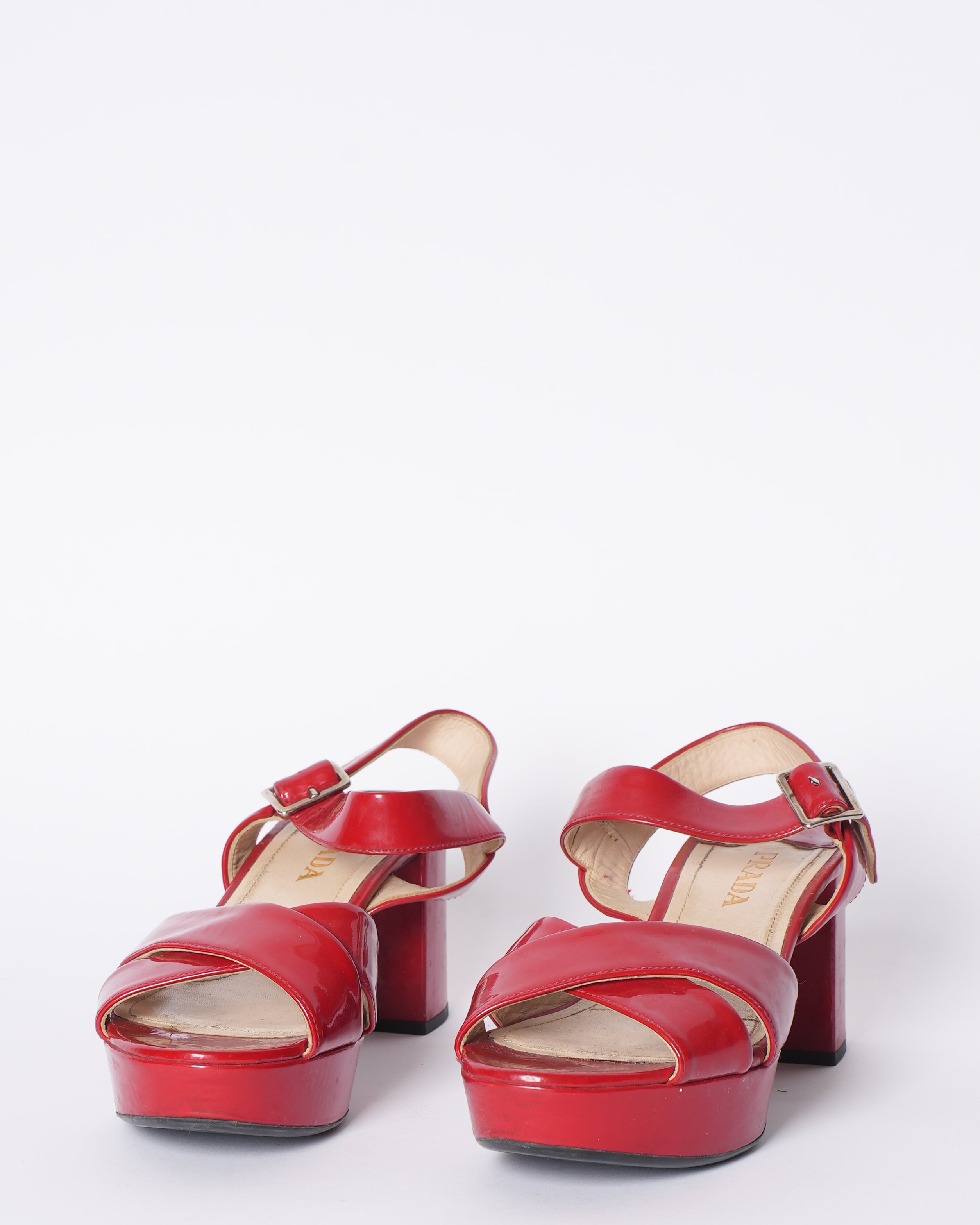 Prada Cross Strap Block Heels In Red Patent Leather