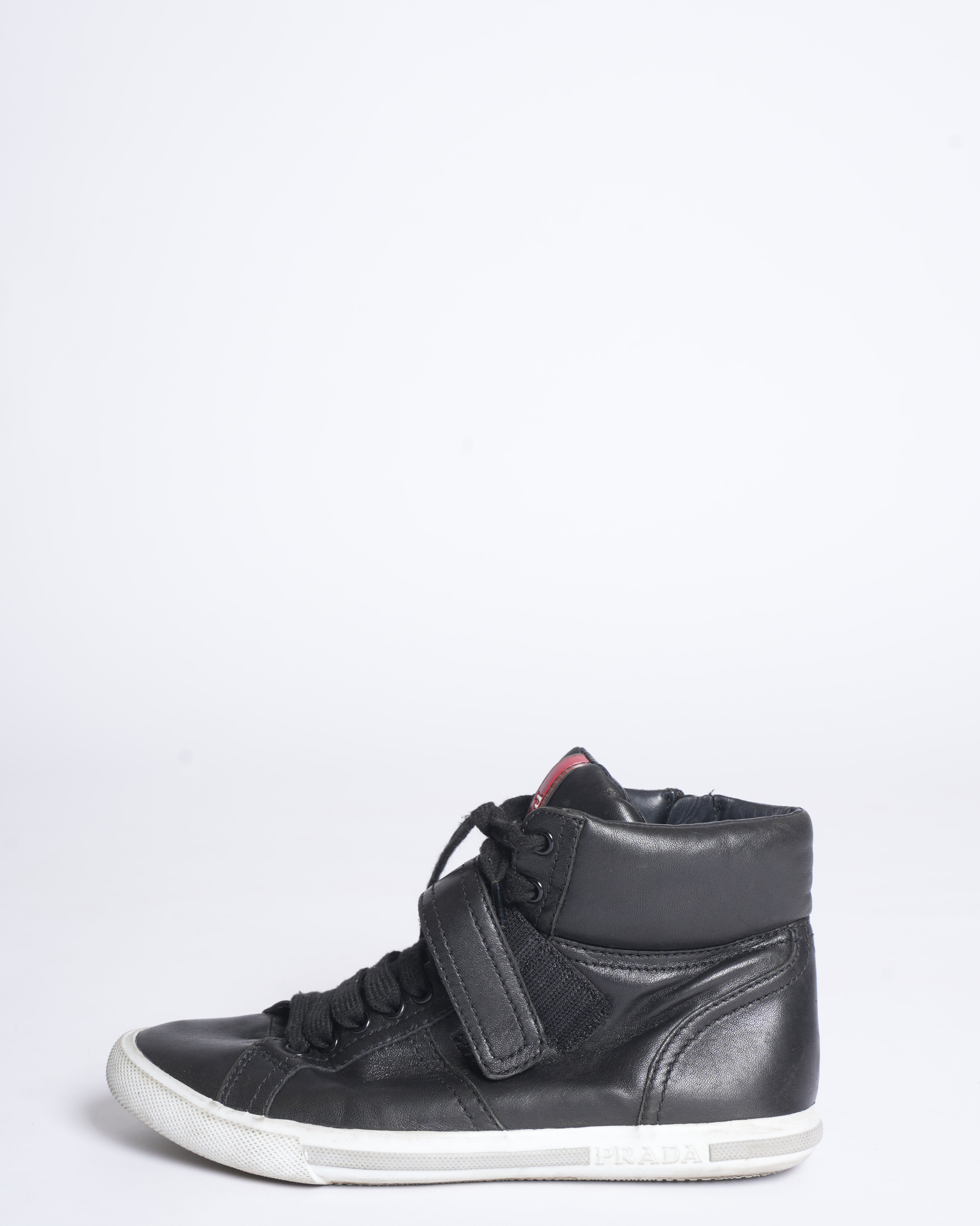 Prada high top black leather sneakers