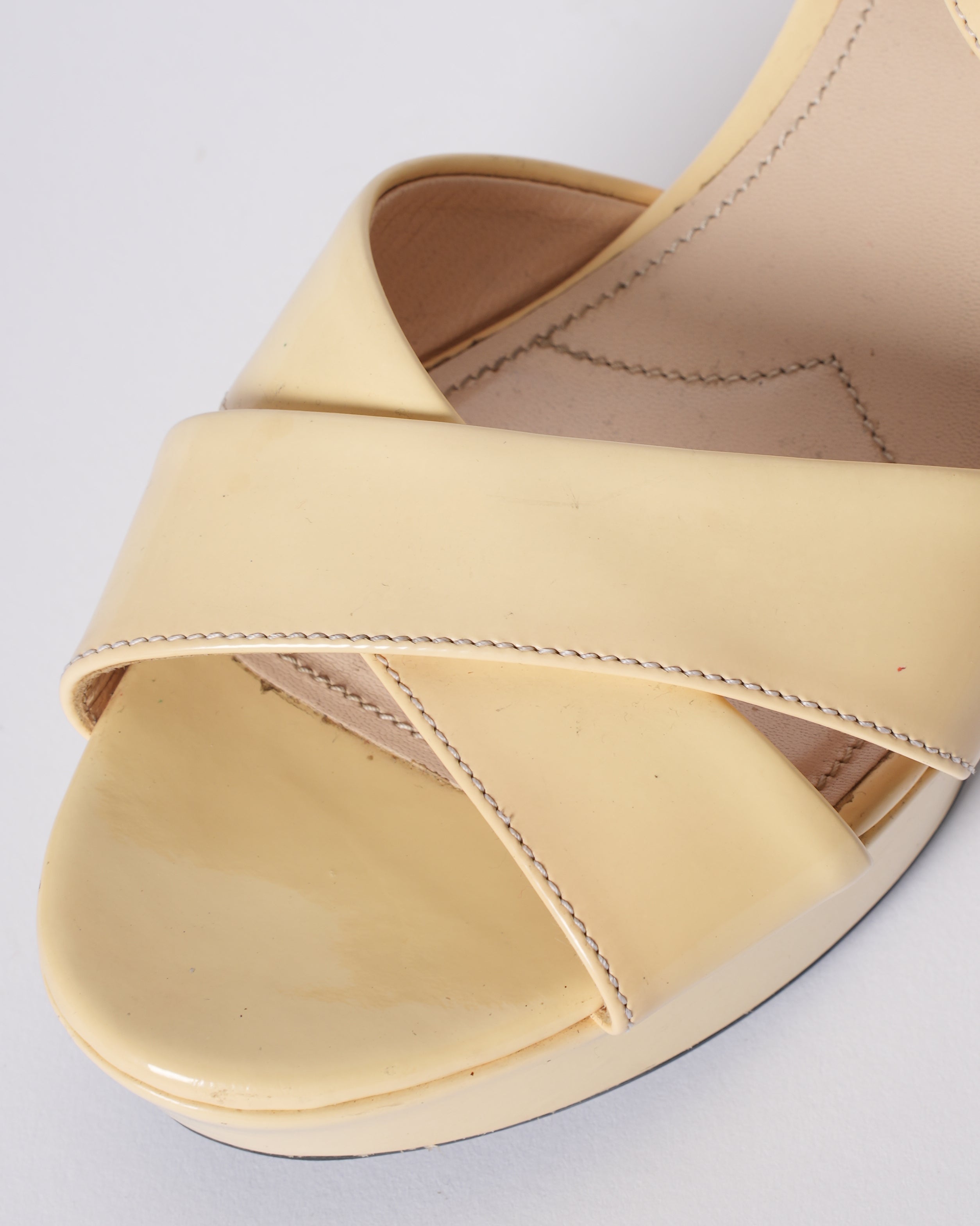 Prada Cross Strap Block Heels In Off-white Patent Leather