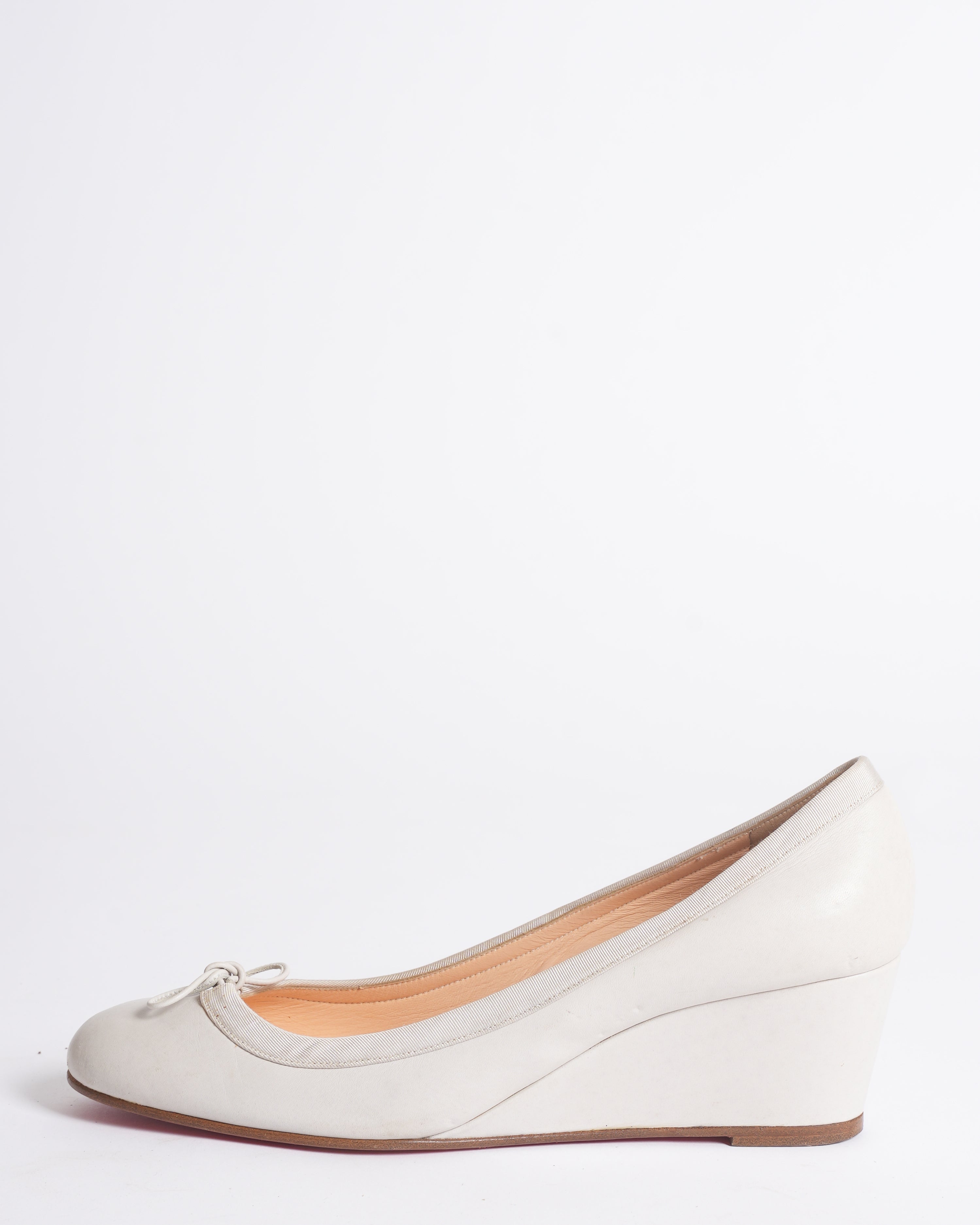 Christian Louboutin Wedges in White