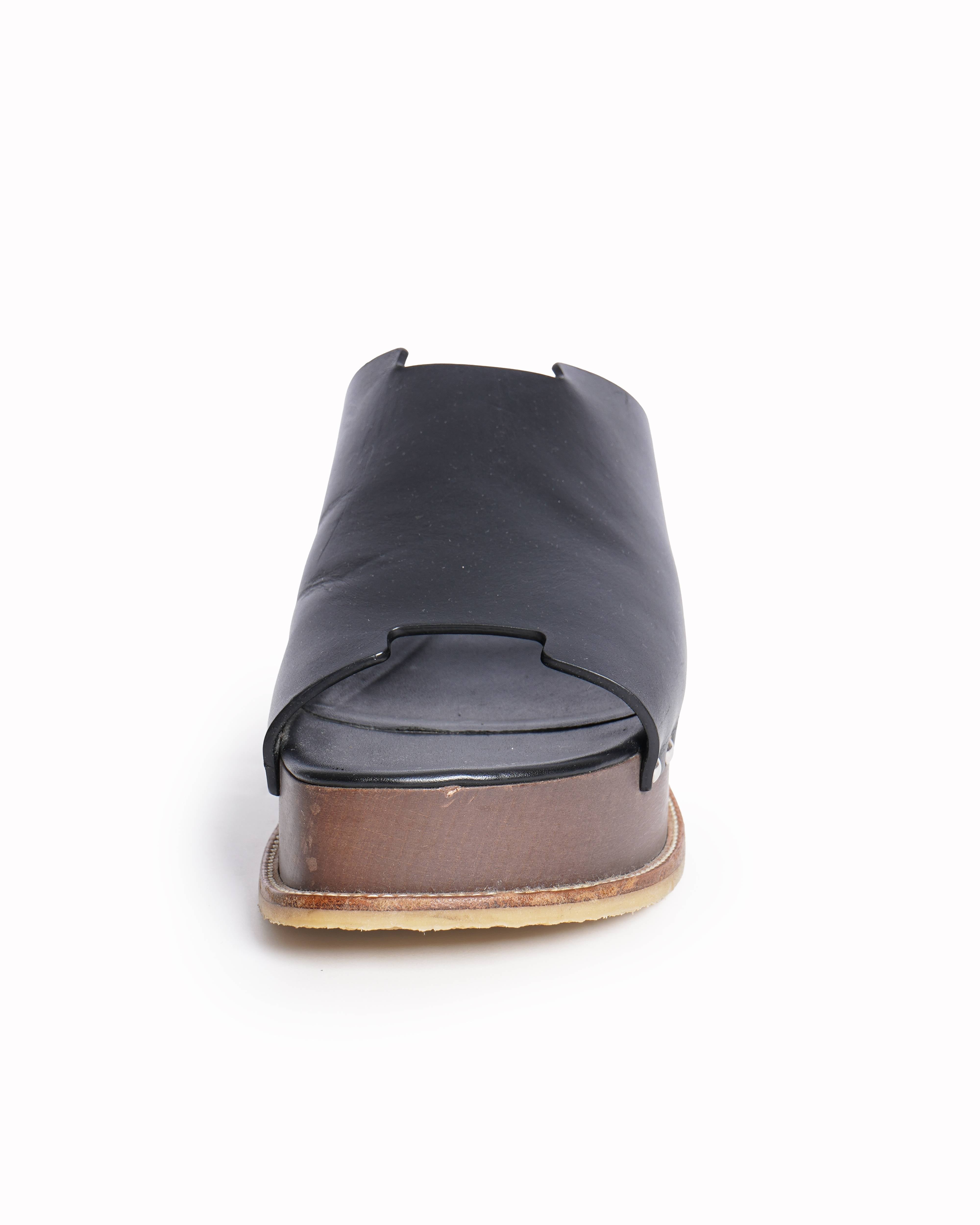 Hermès Black leather and wood Ellipse slip-on wedge sandals