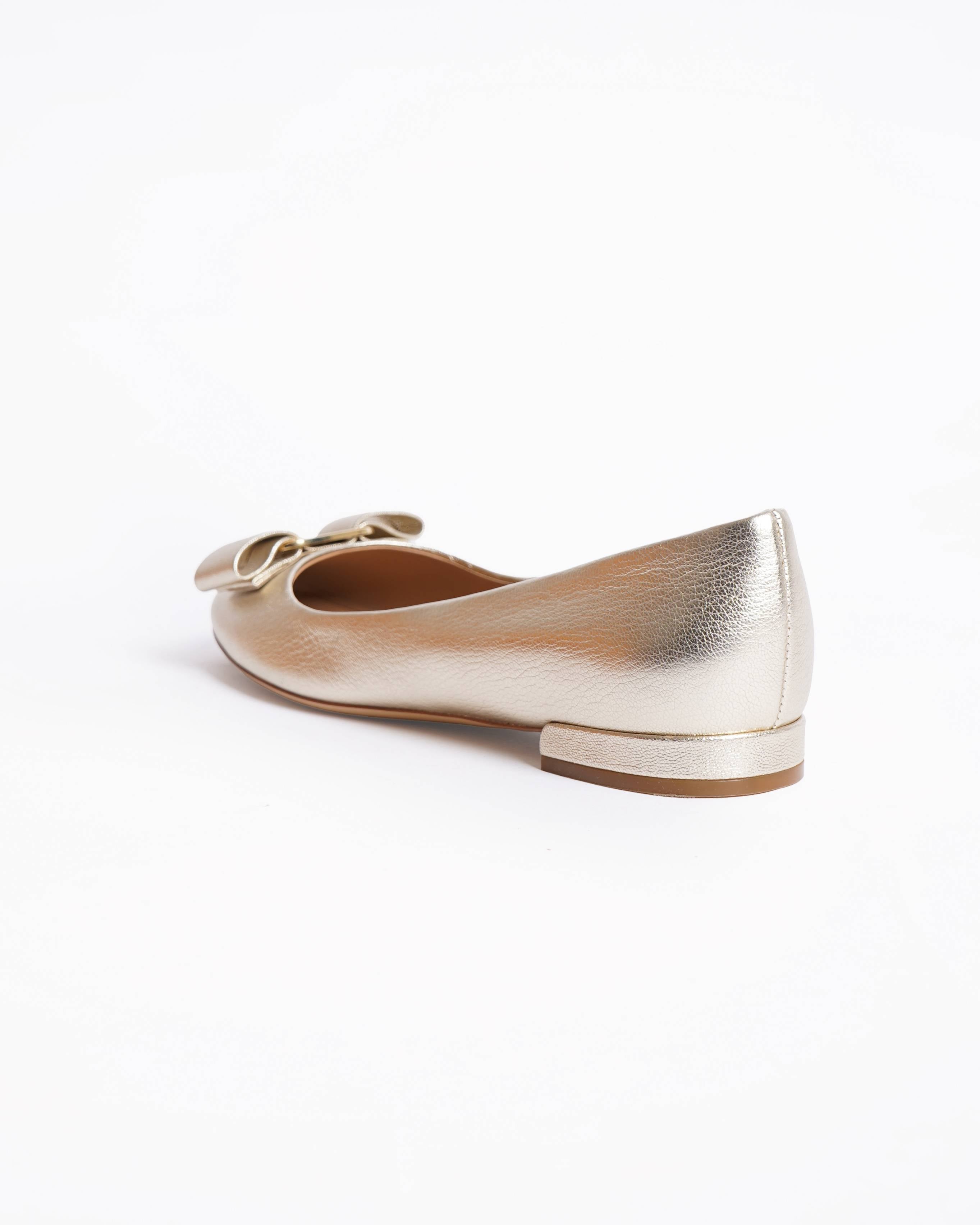 Salvatore Ferragamo Leather ballet flats in gold