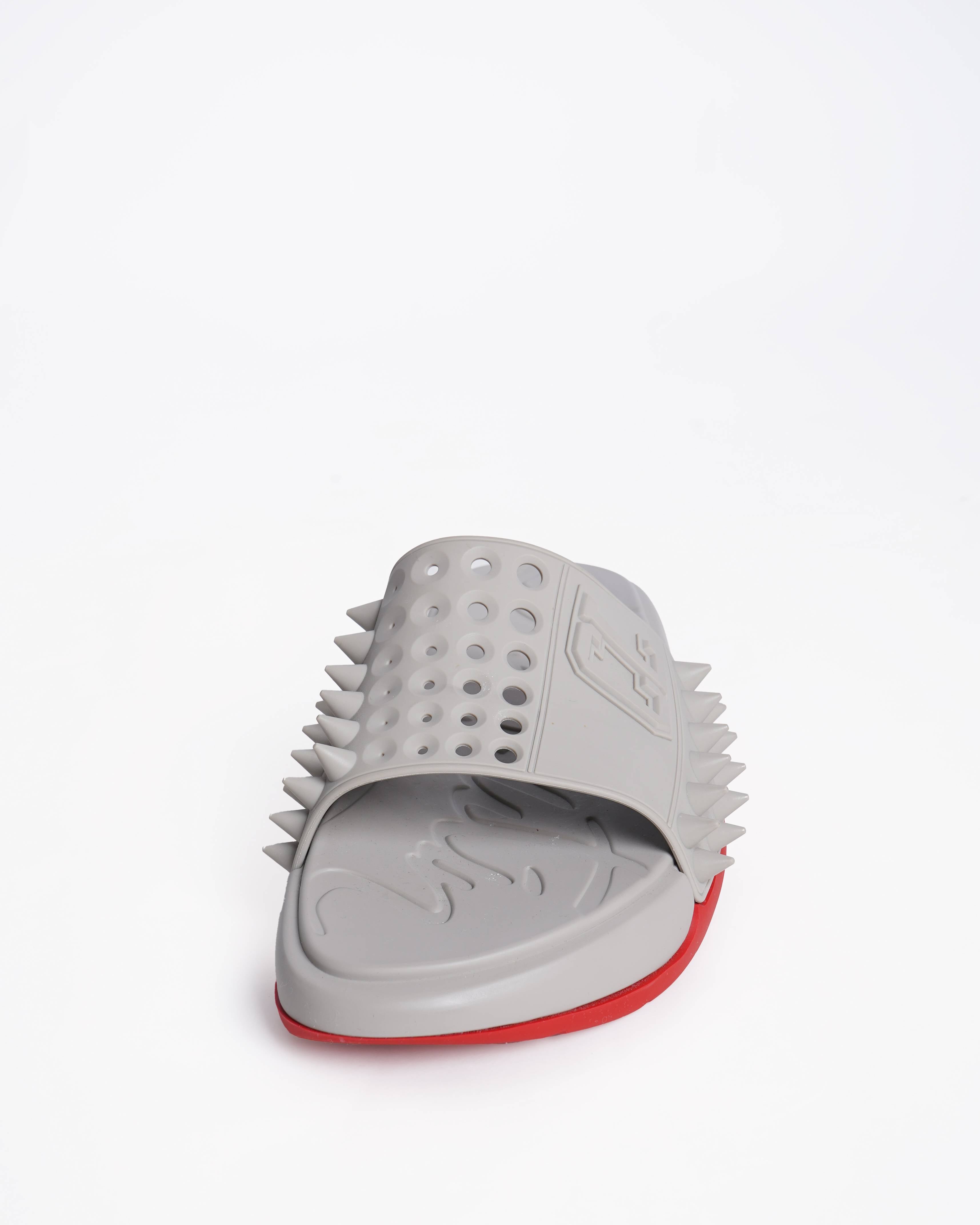 New Christian Louboutin
Take It Easy perforated spiked slides