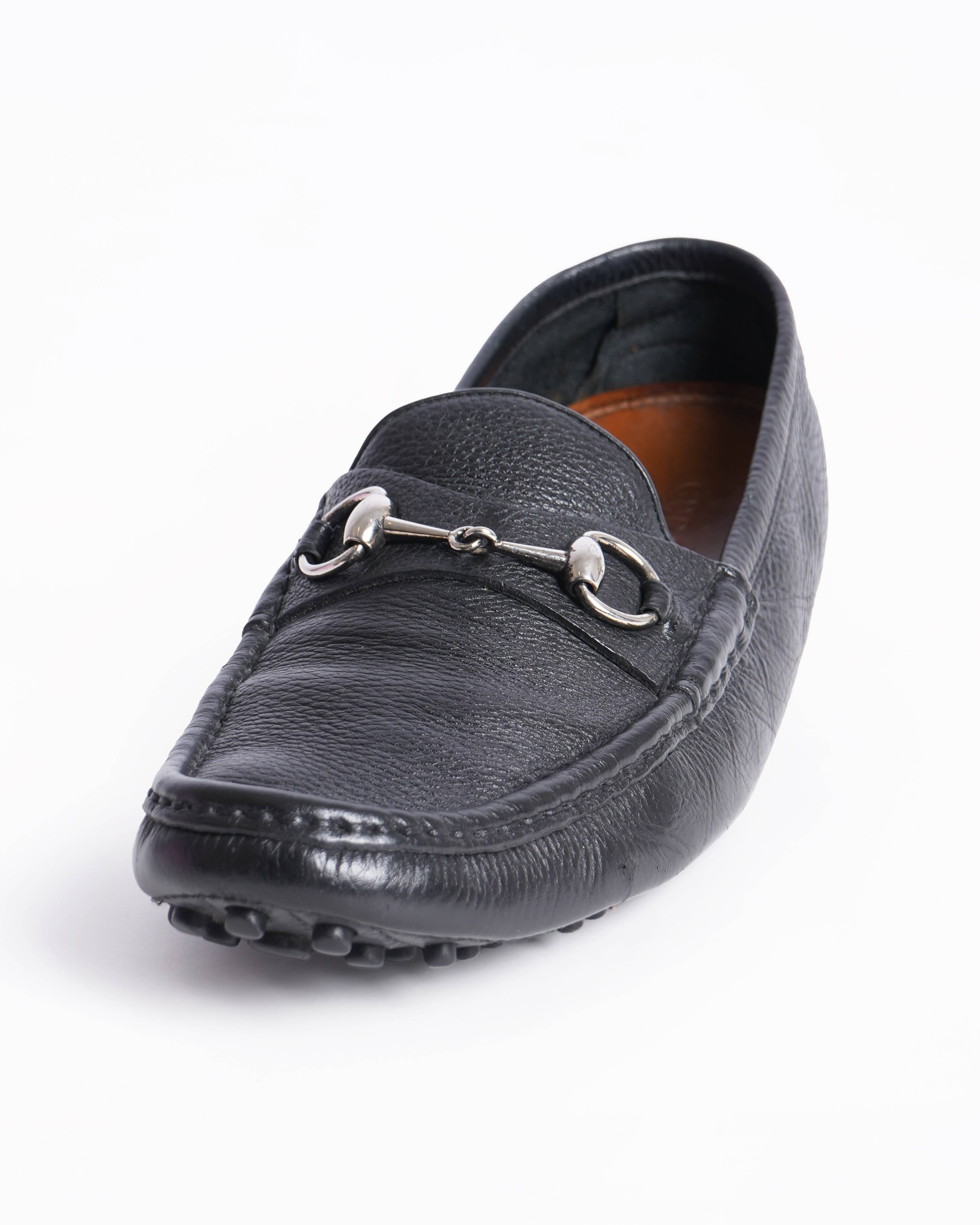 Gucci Men's Drivers Loafers In Black WIth Metal Detailing On Toe Box