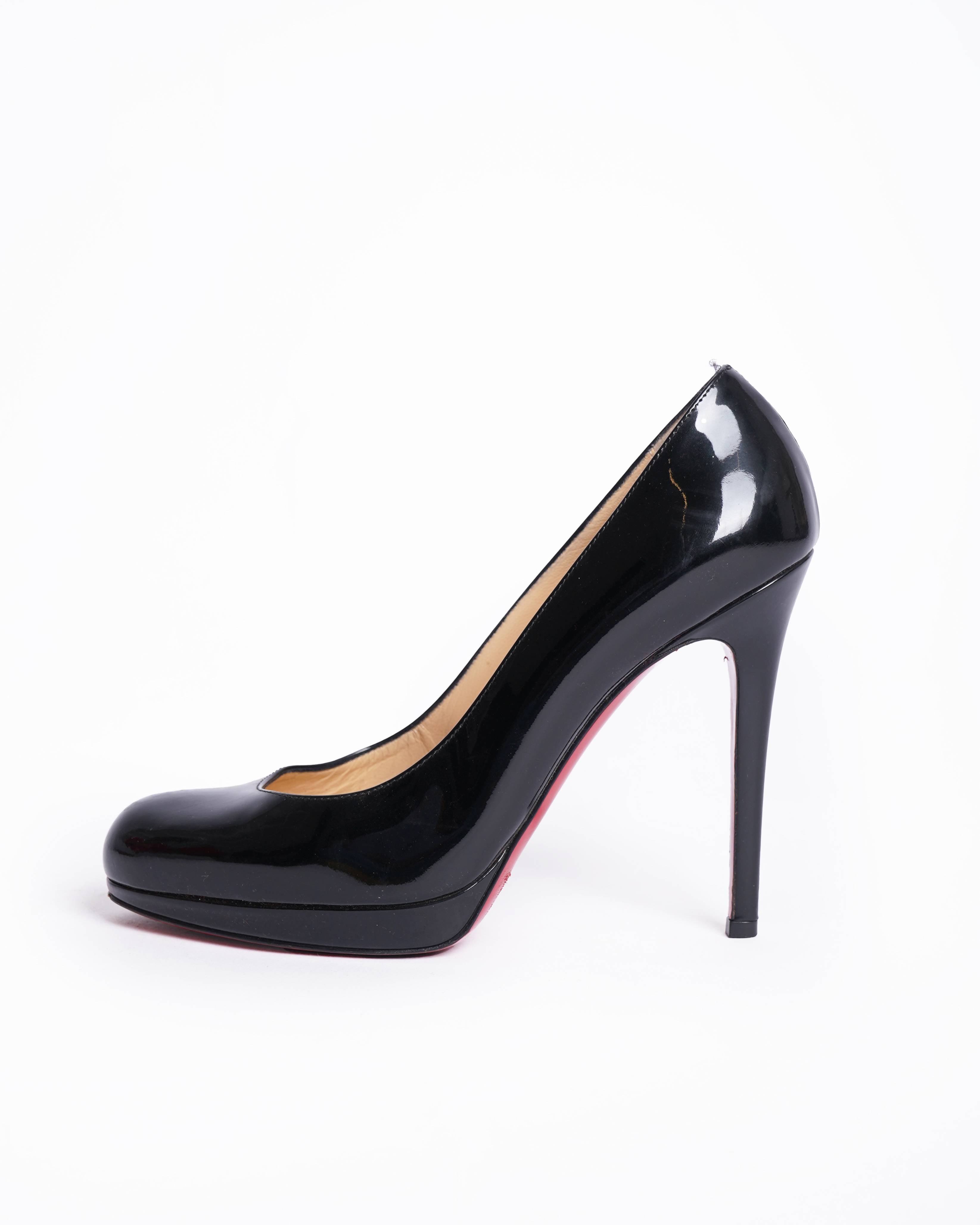 Christian Louboutin Black Round Toe Pumps In Patent Leather