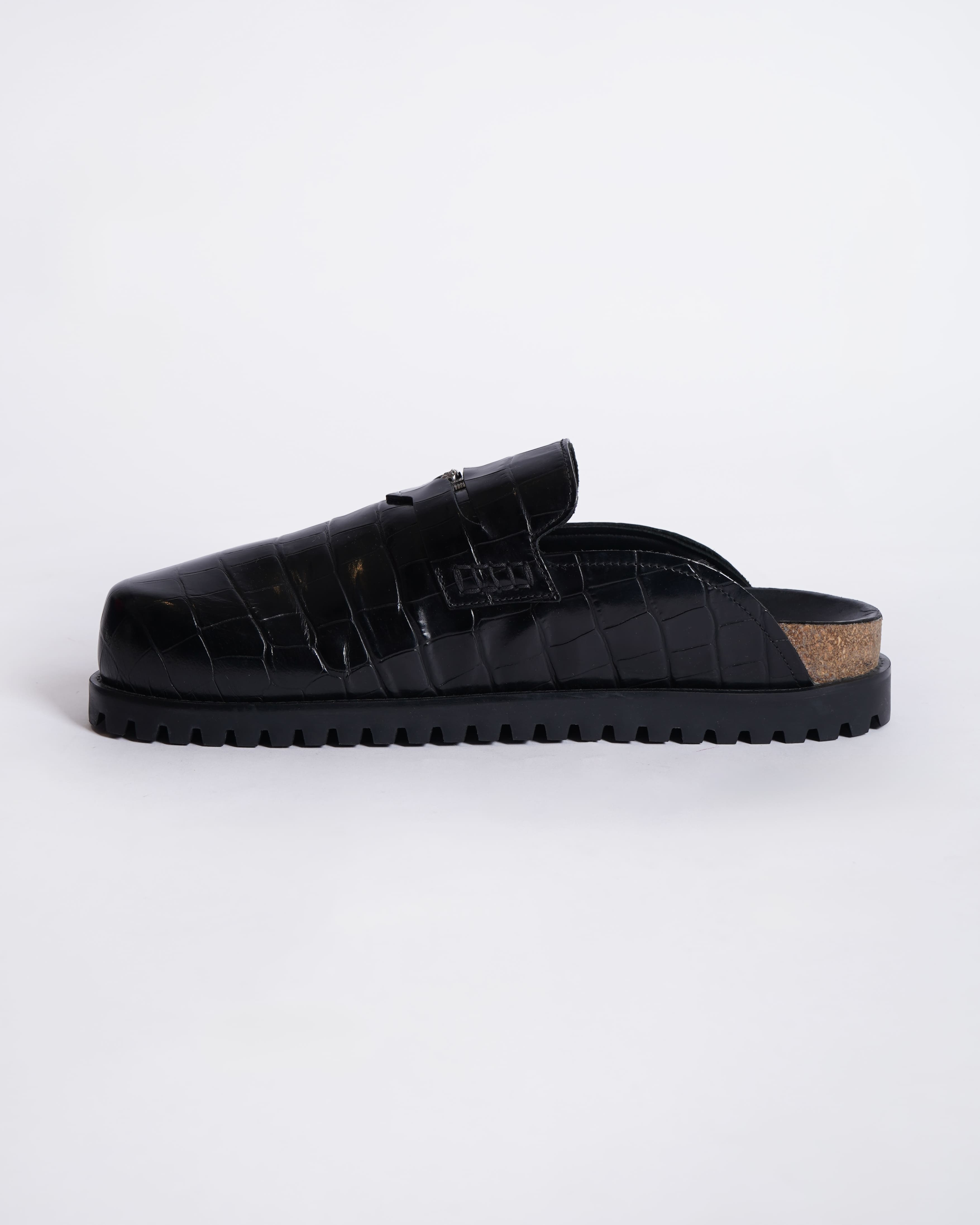 New Versace
Medusa crocodile-embossed slides