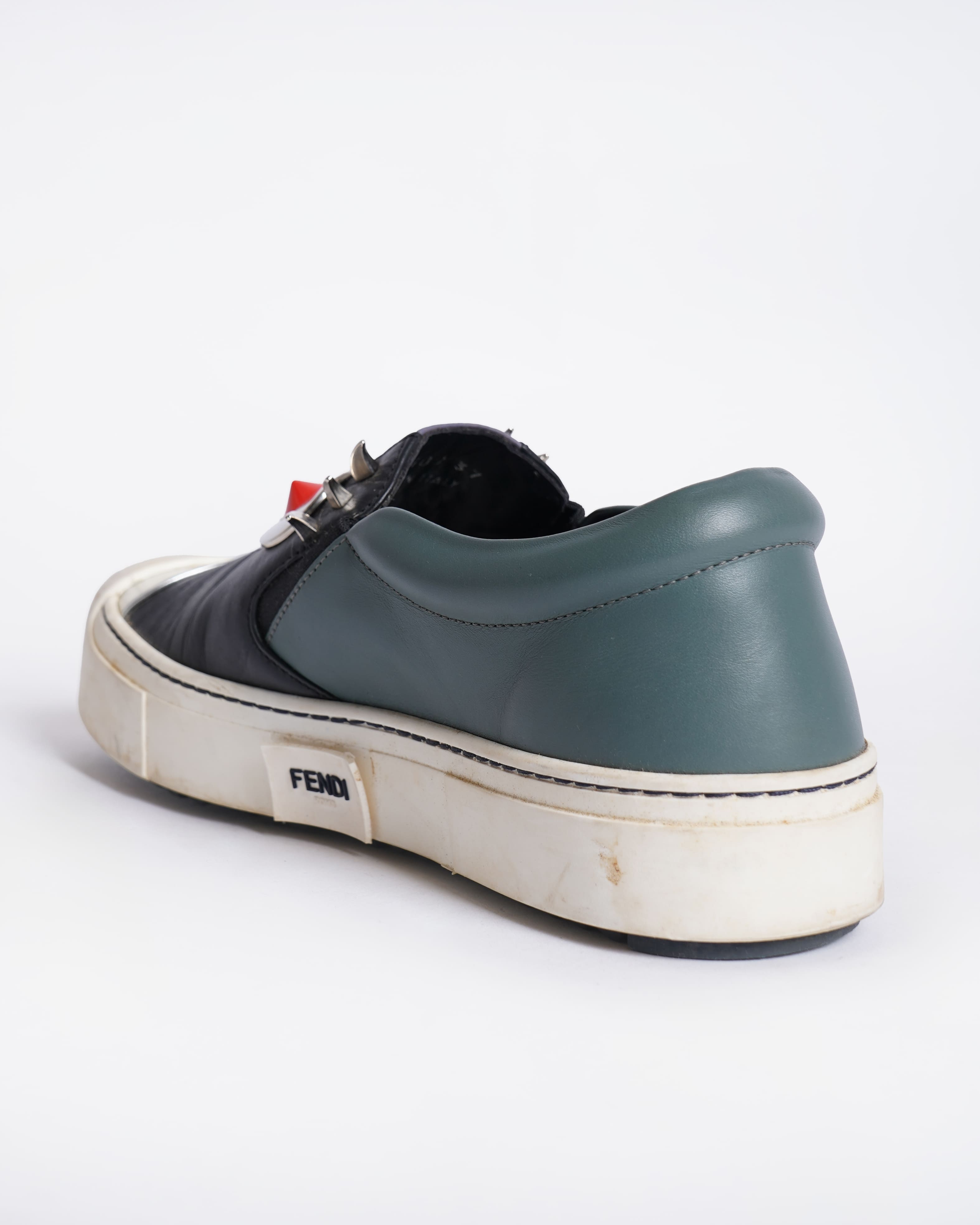 Fendi monster black leather slip on sneakers