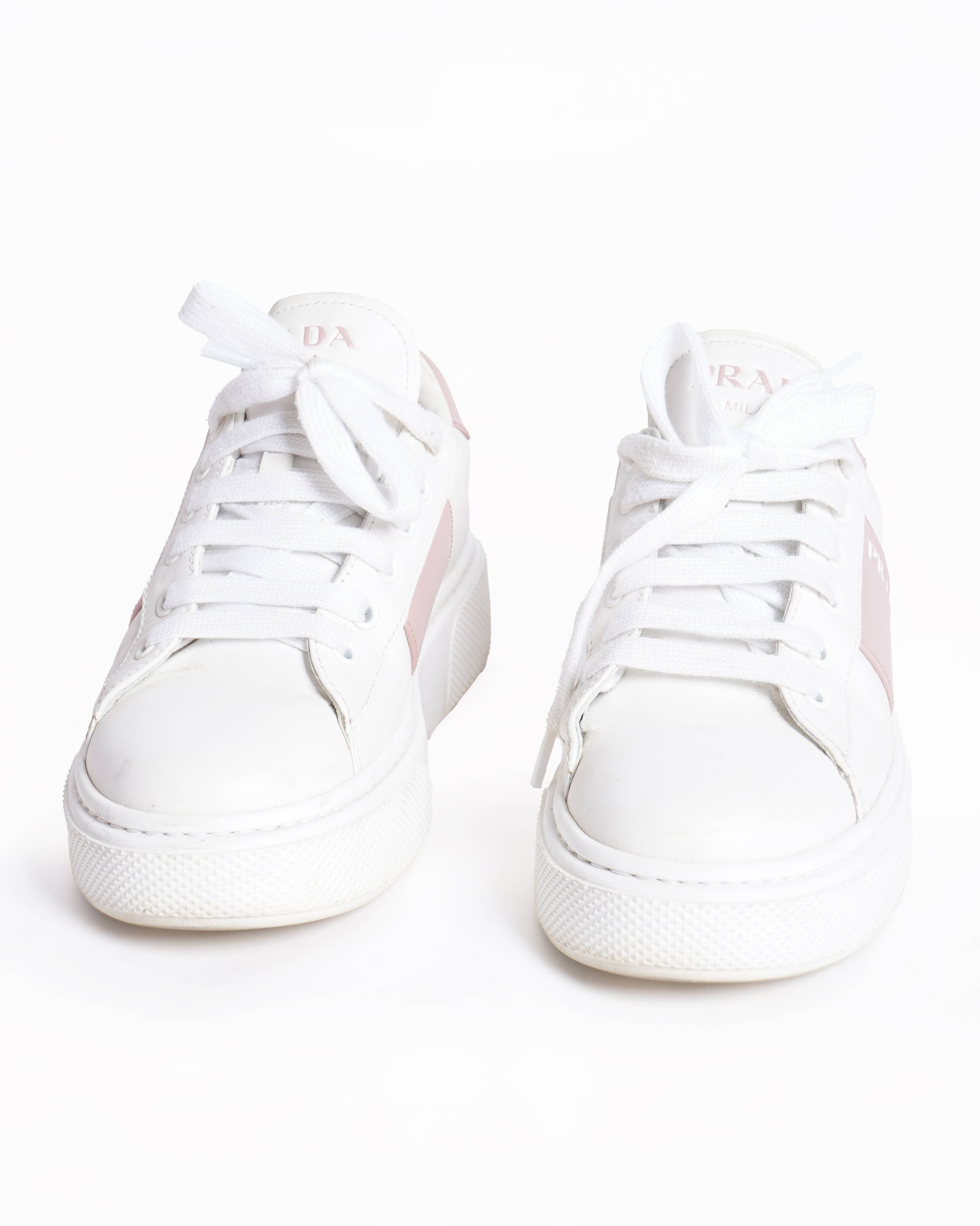 Prada women's pink and white trainers
