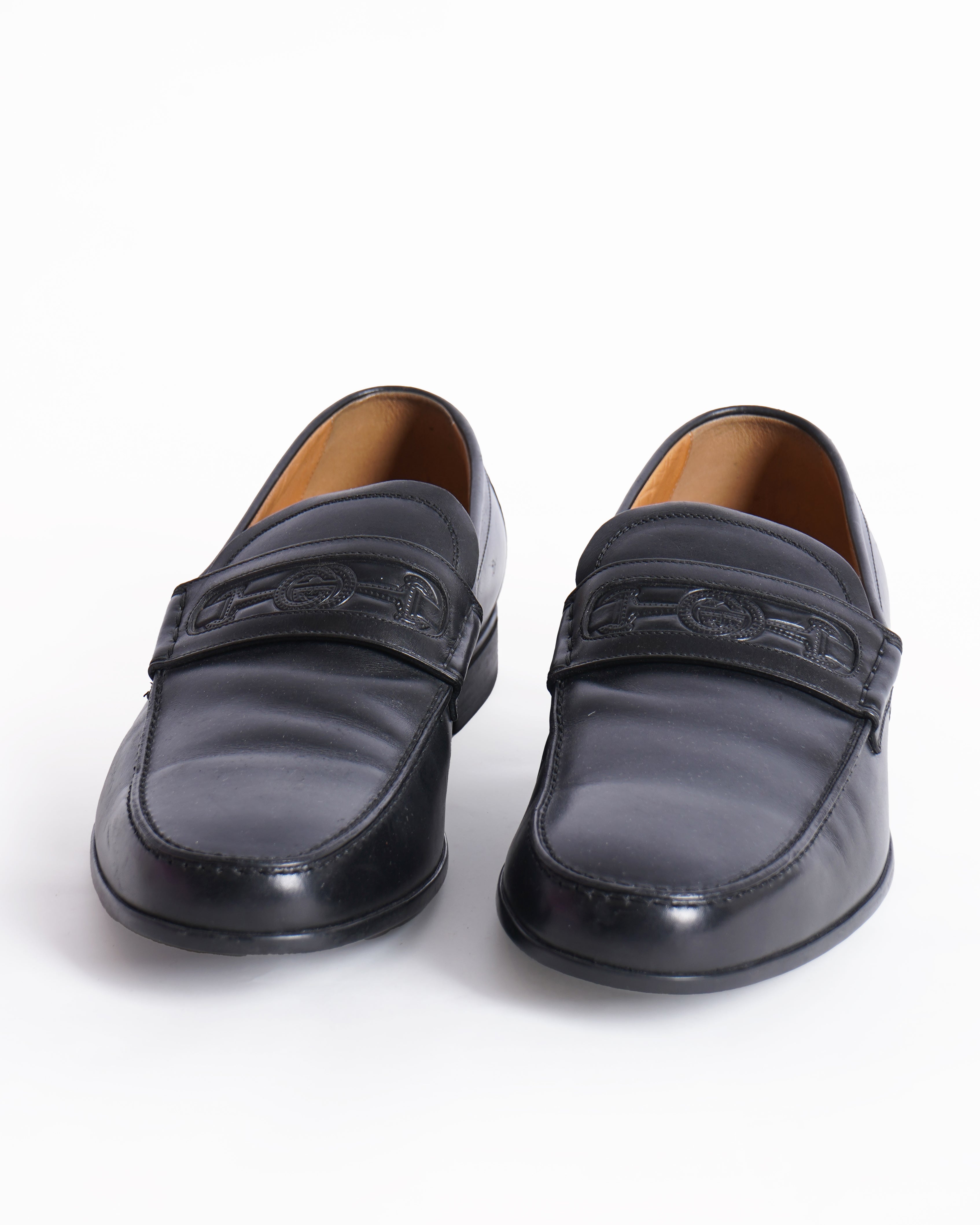 Gucci black leather GG embossed loafers