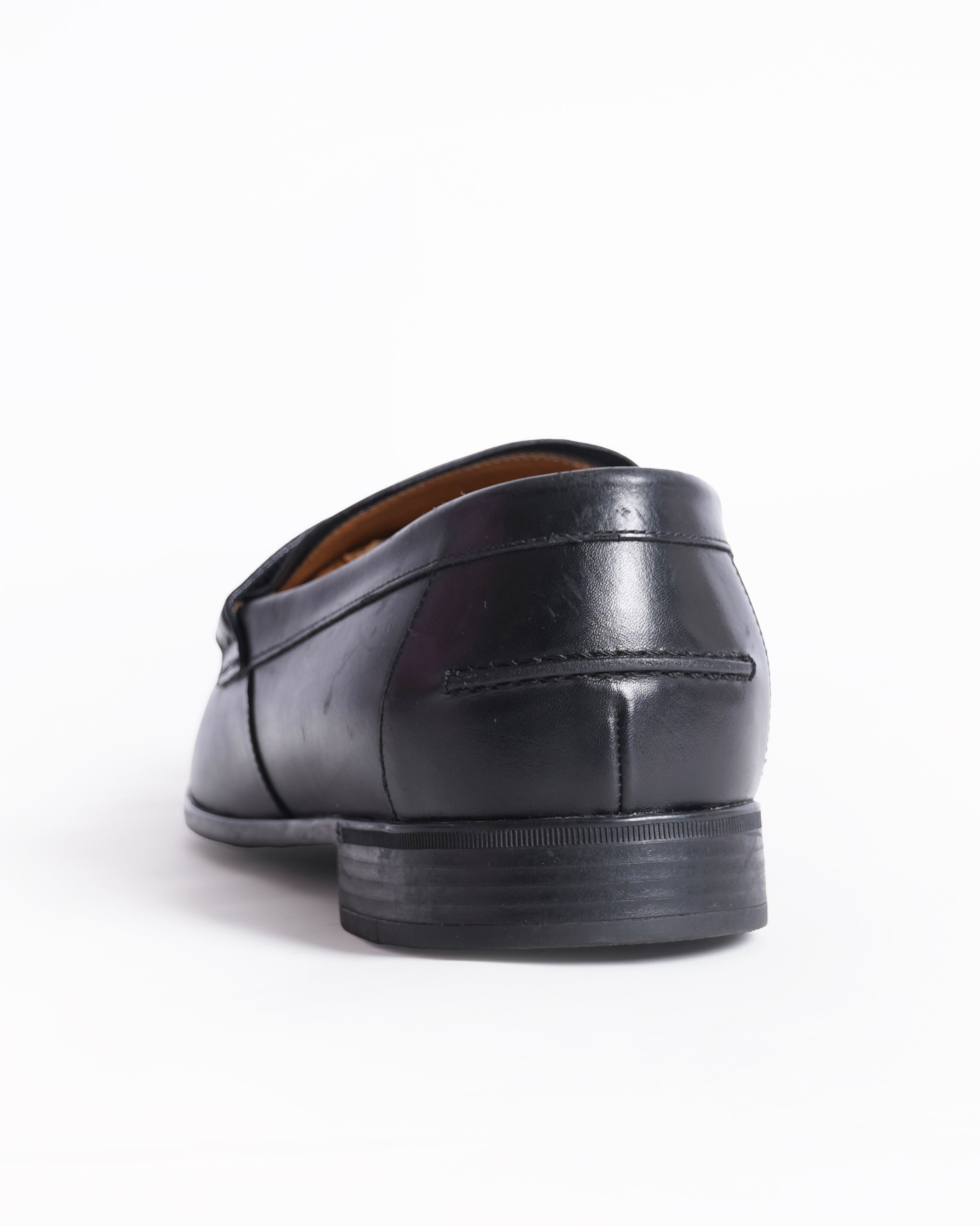 Gucci black leather GG embossed loafers