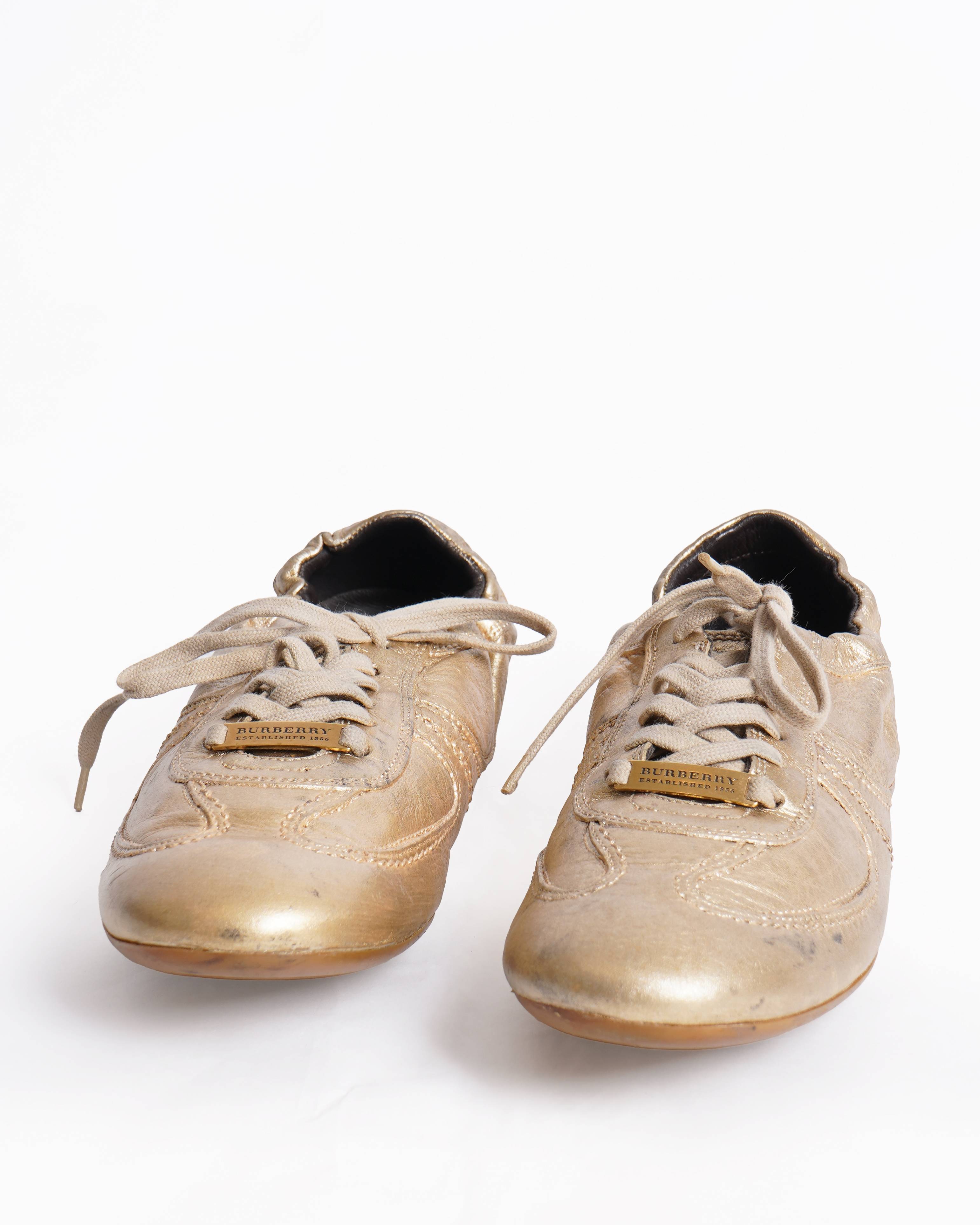 Burberry leather sneakers in a metallic gold finish