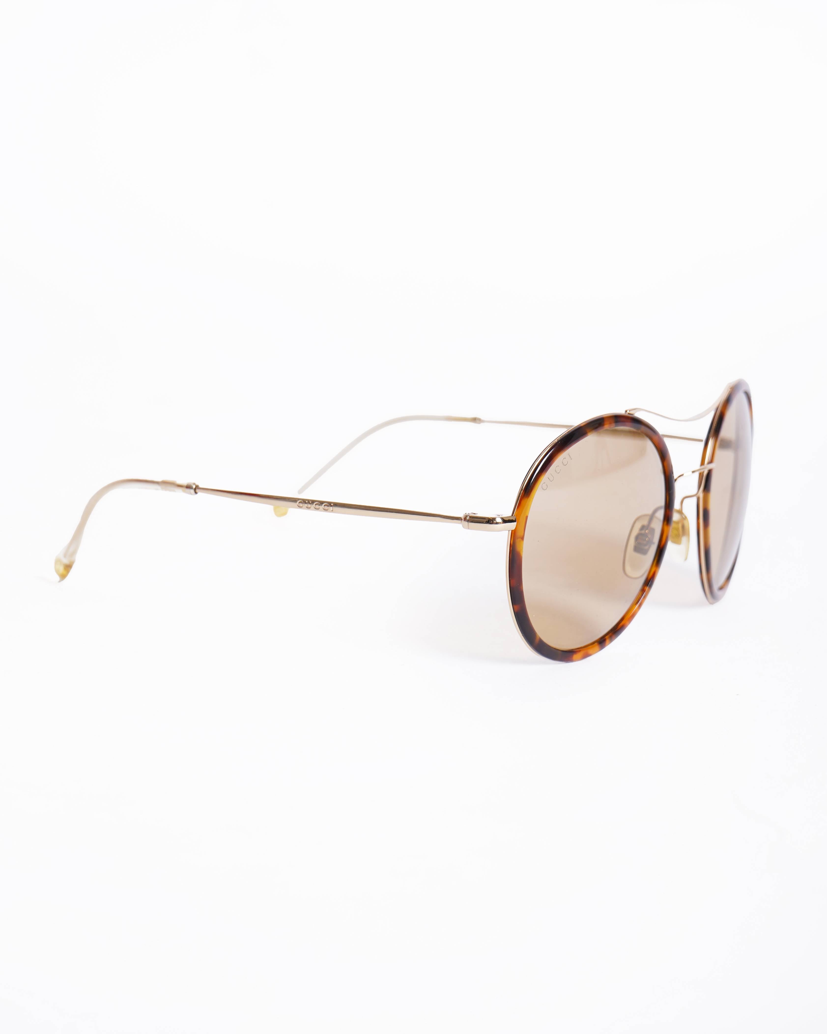 Gucci Round Women's sunglasses In Brown
