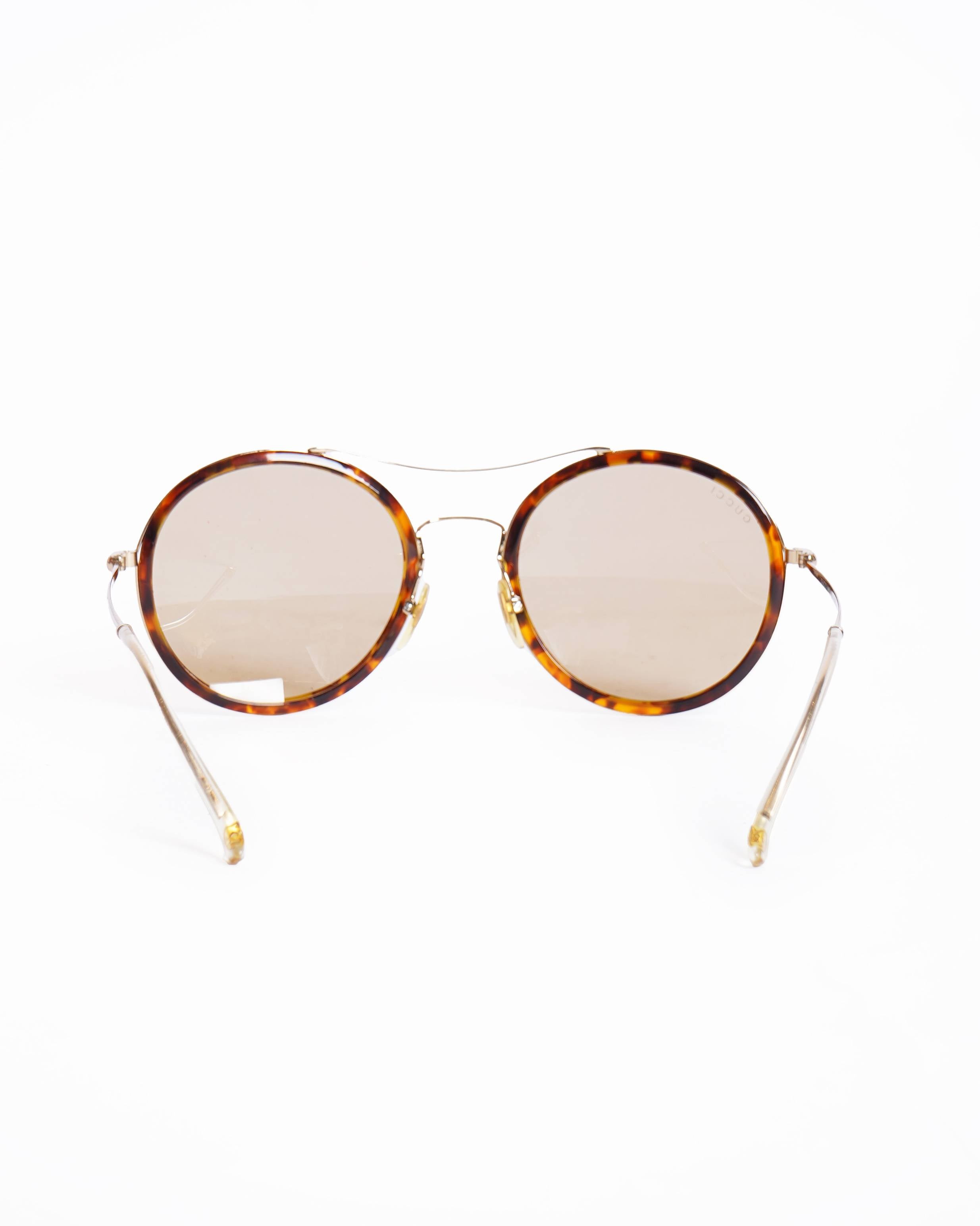 Gucci Round Women's sunglasses In Brown