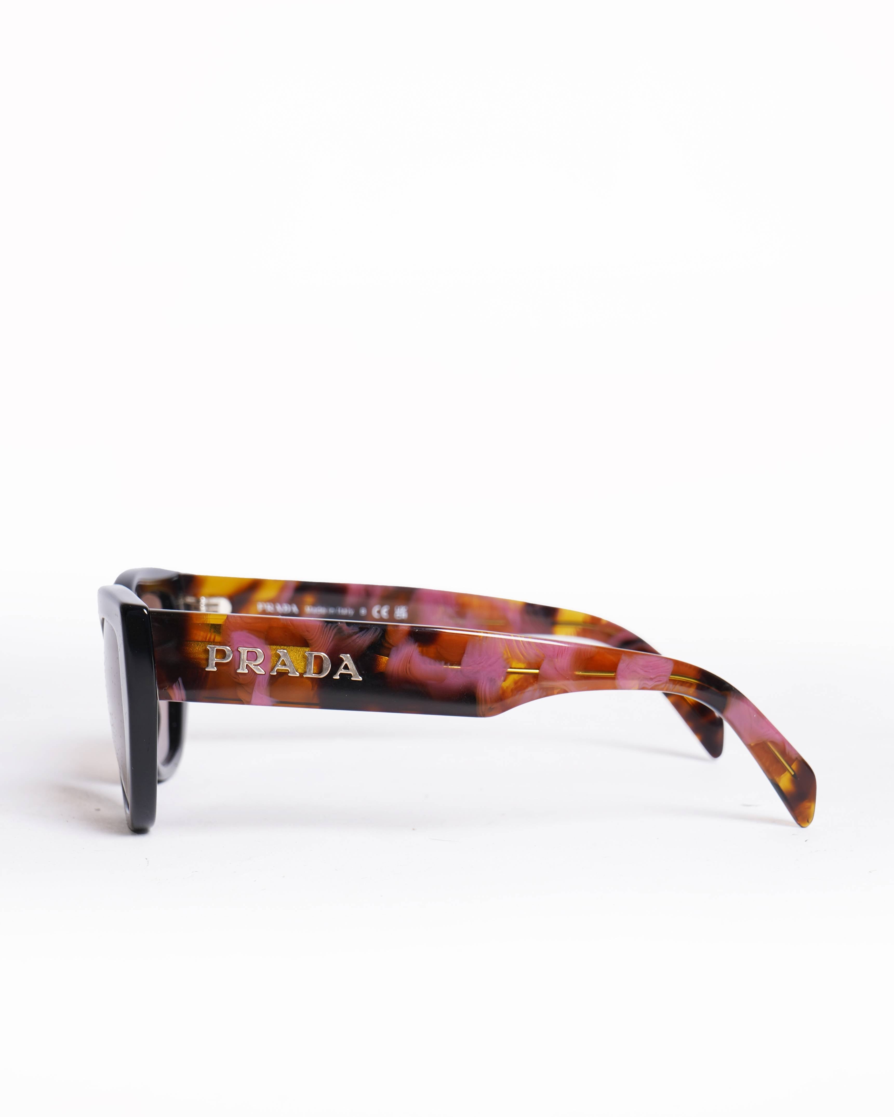 Prada Womenβs Cat Eye Sunglasses in Pink & Black