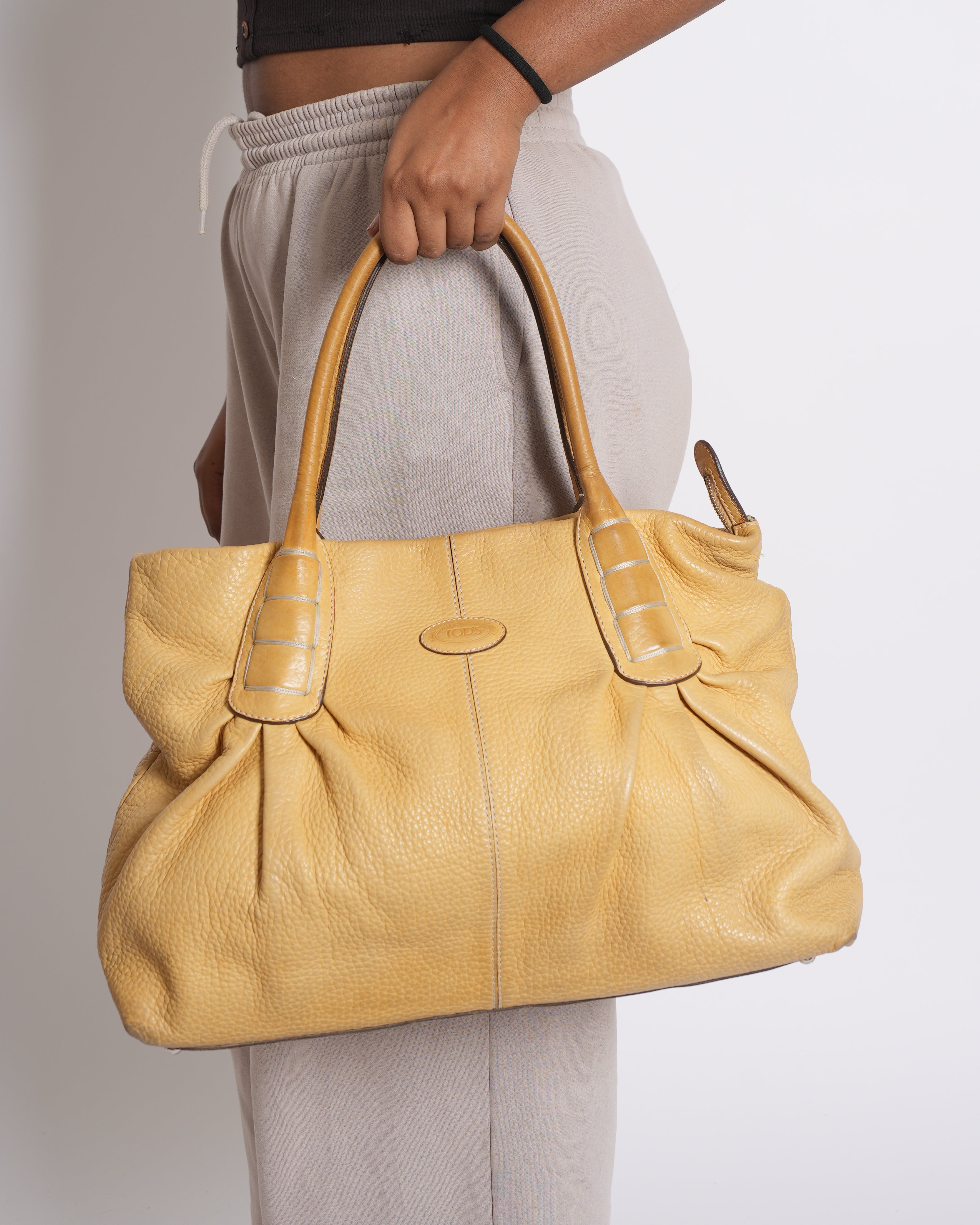 Tods Pebbled Leather Mustard Handbag