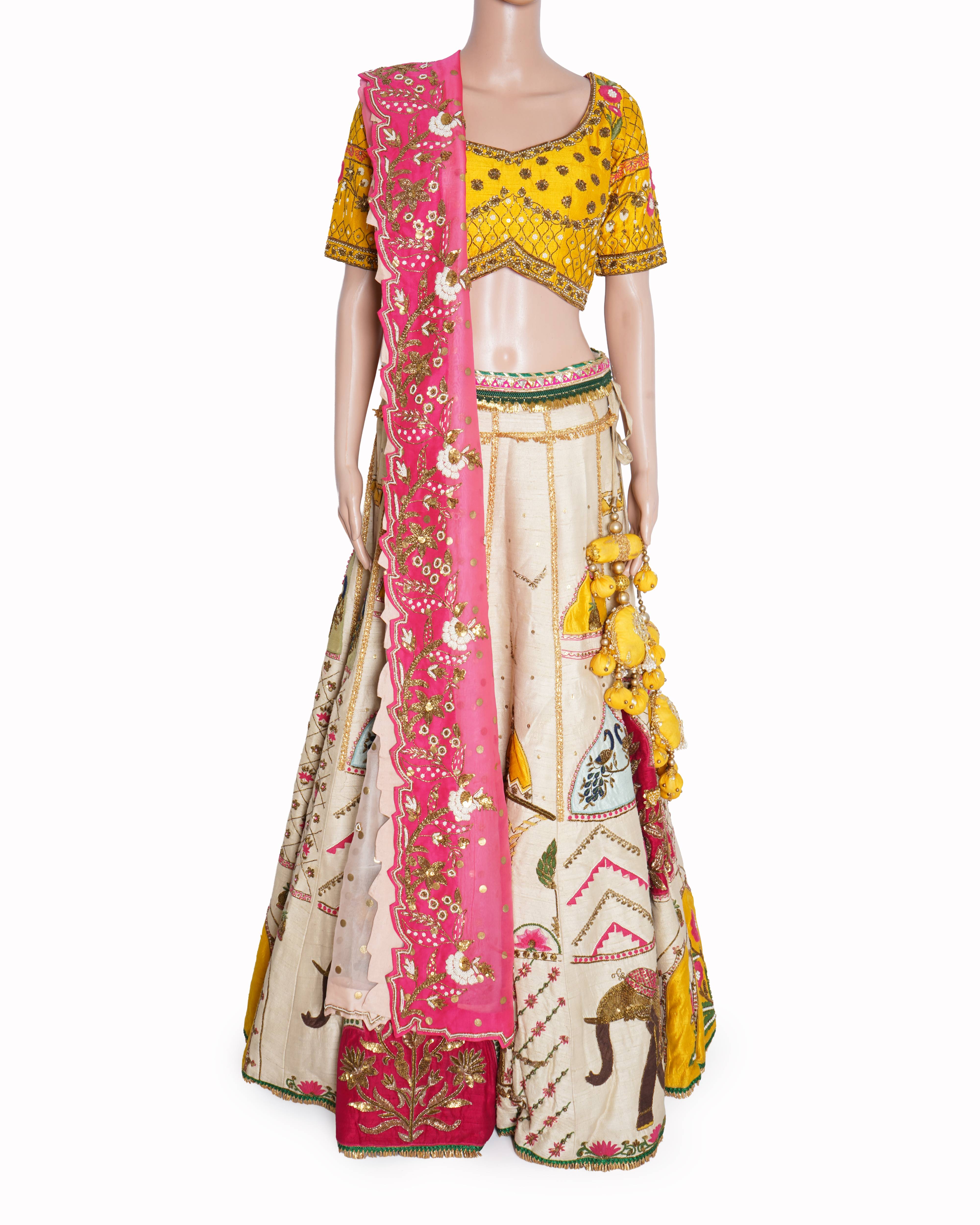 Gazal Gupta off-white and pink embroidered lehenga