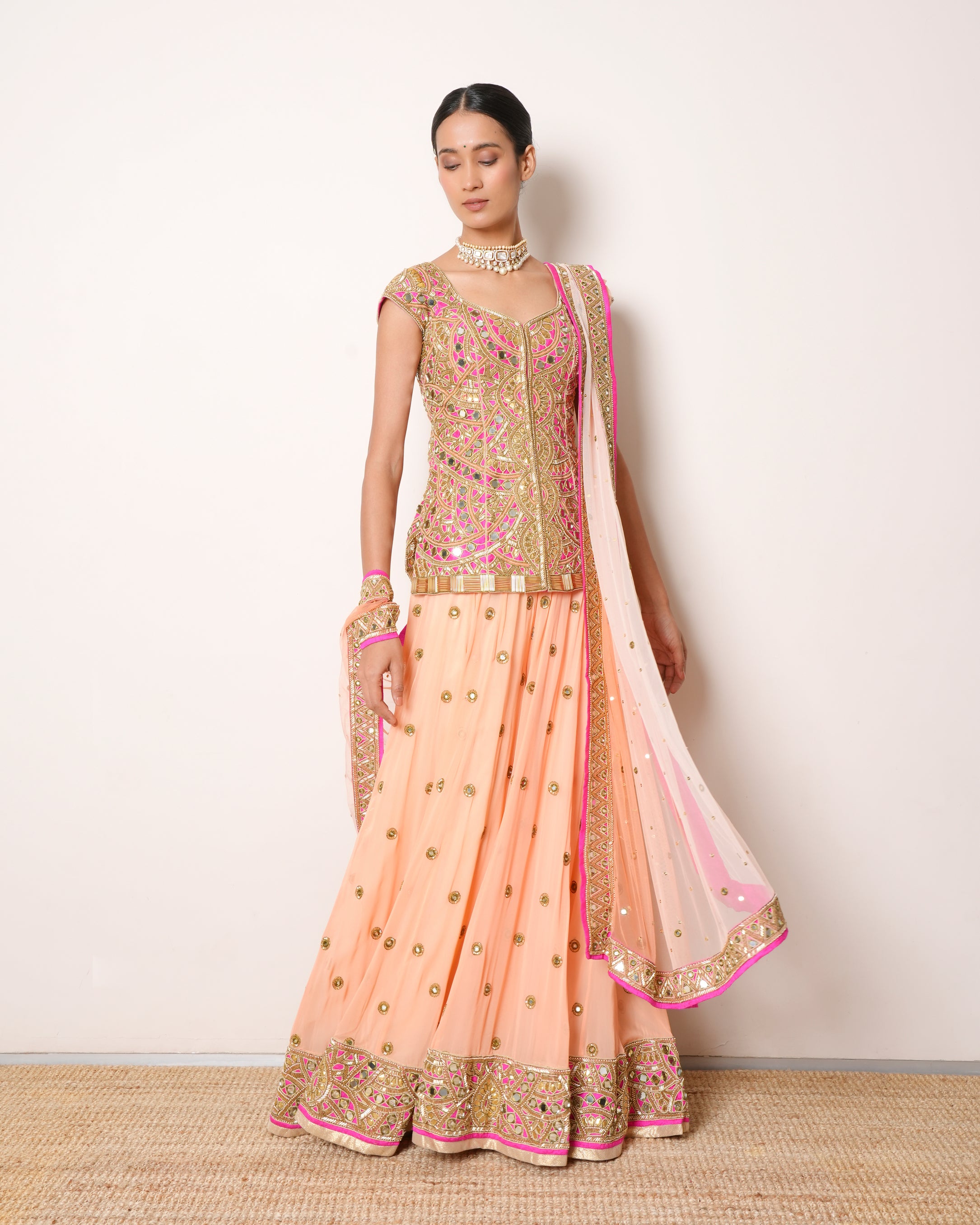 Arpita Mehta Peach Lehenga With Mirror Work