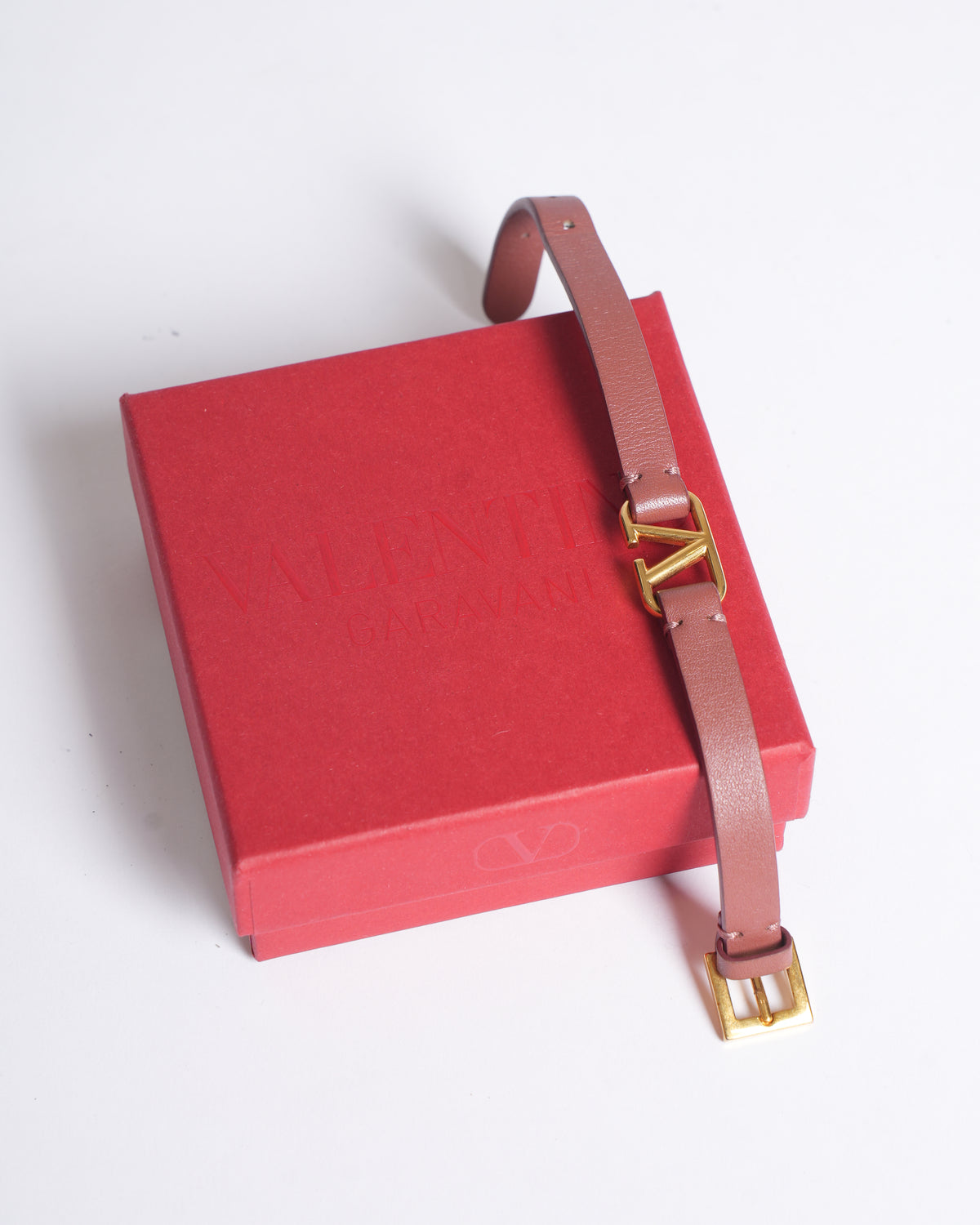 Valentino v logo  leather gold tone wrap bracelet