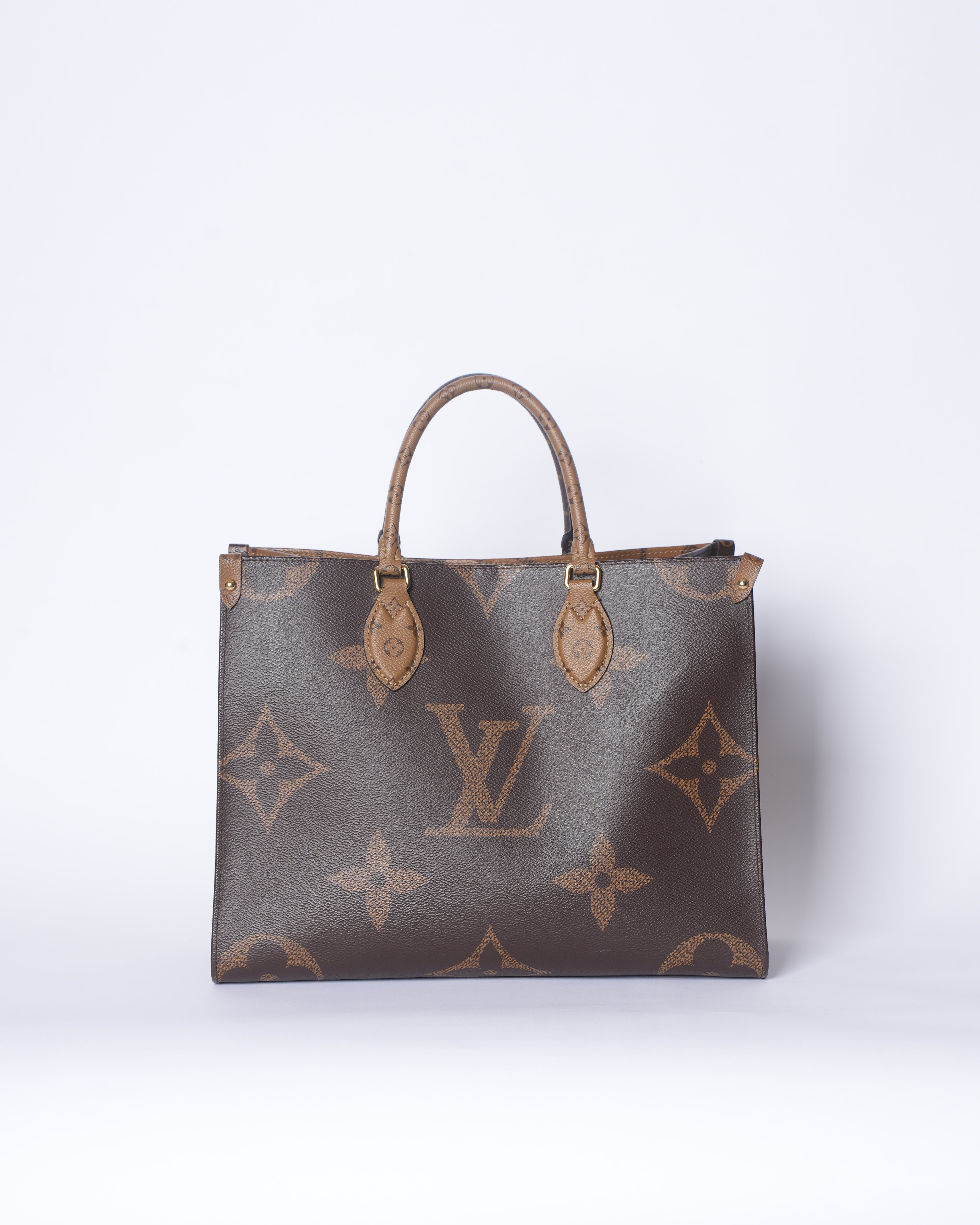 LV On The Go MM Tote In Brown