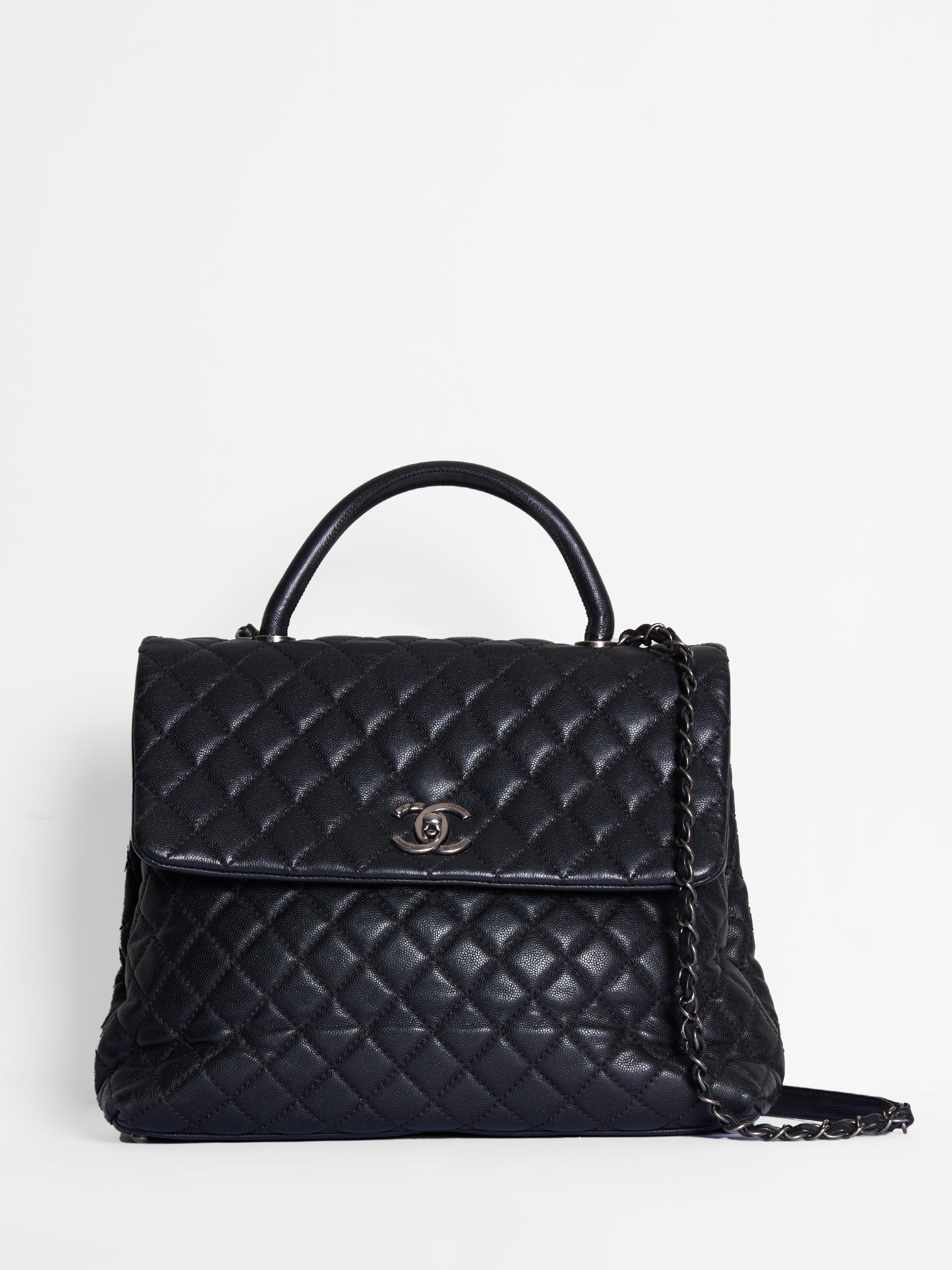Chanel Quilted Caviar Coco Black Handle Bag