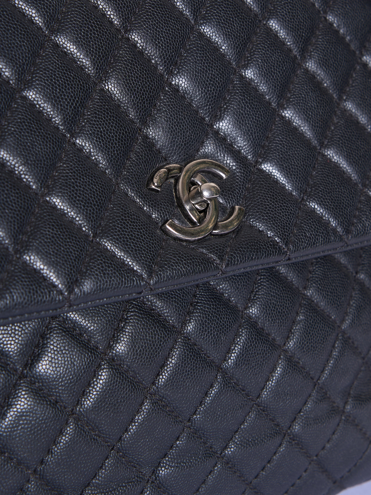 Chanel Quilted Caviar Coco Black Handle Bag