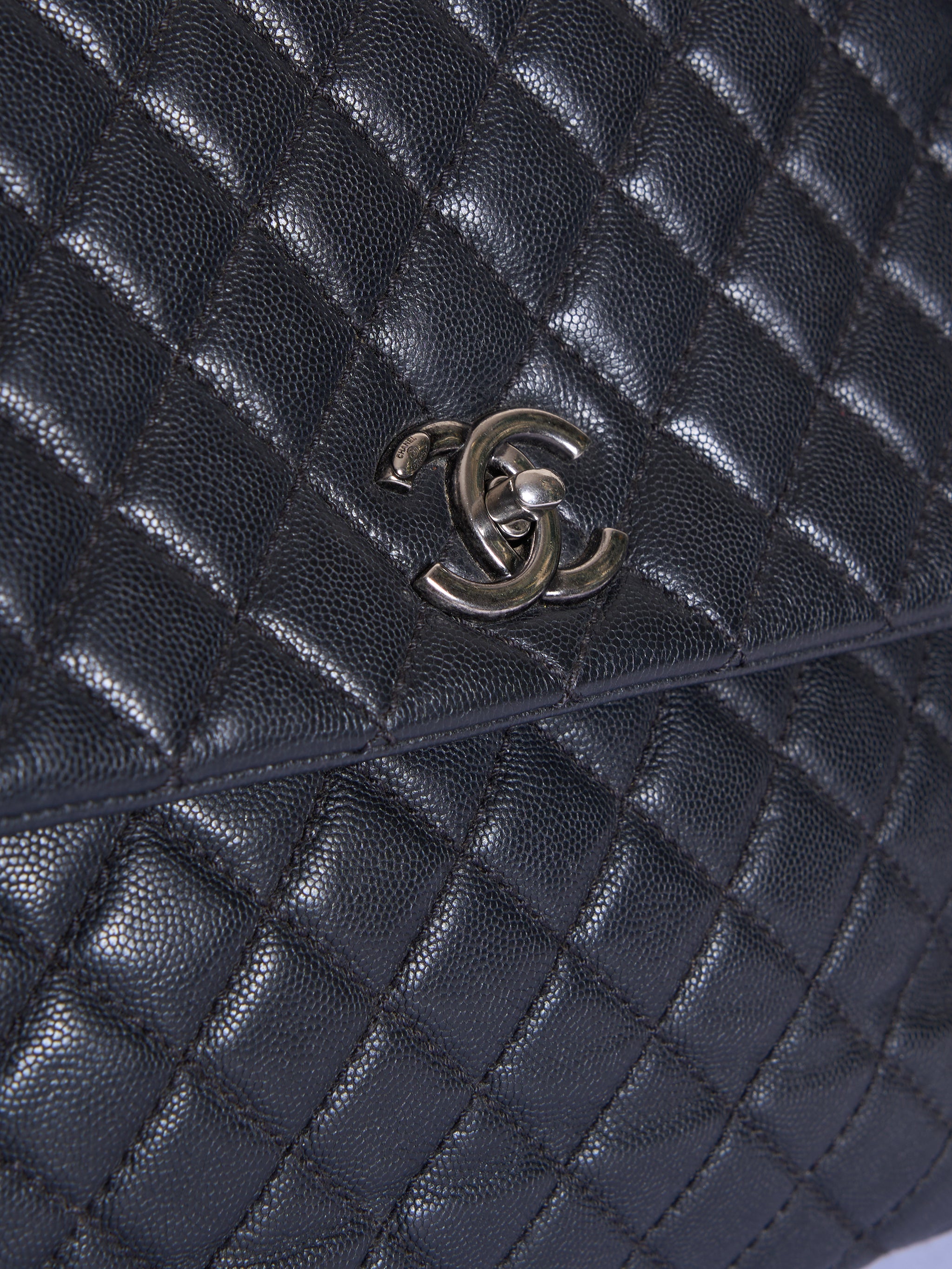 Chanel Quilted Caviar Coco Black Handle Bag