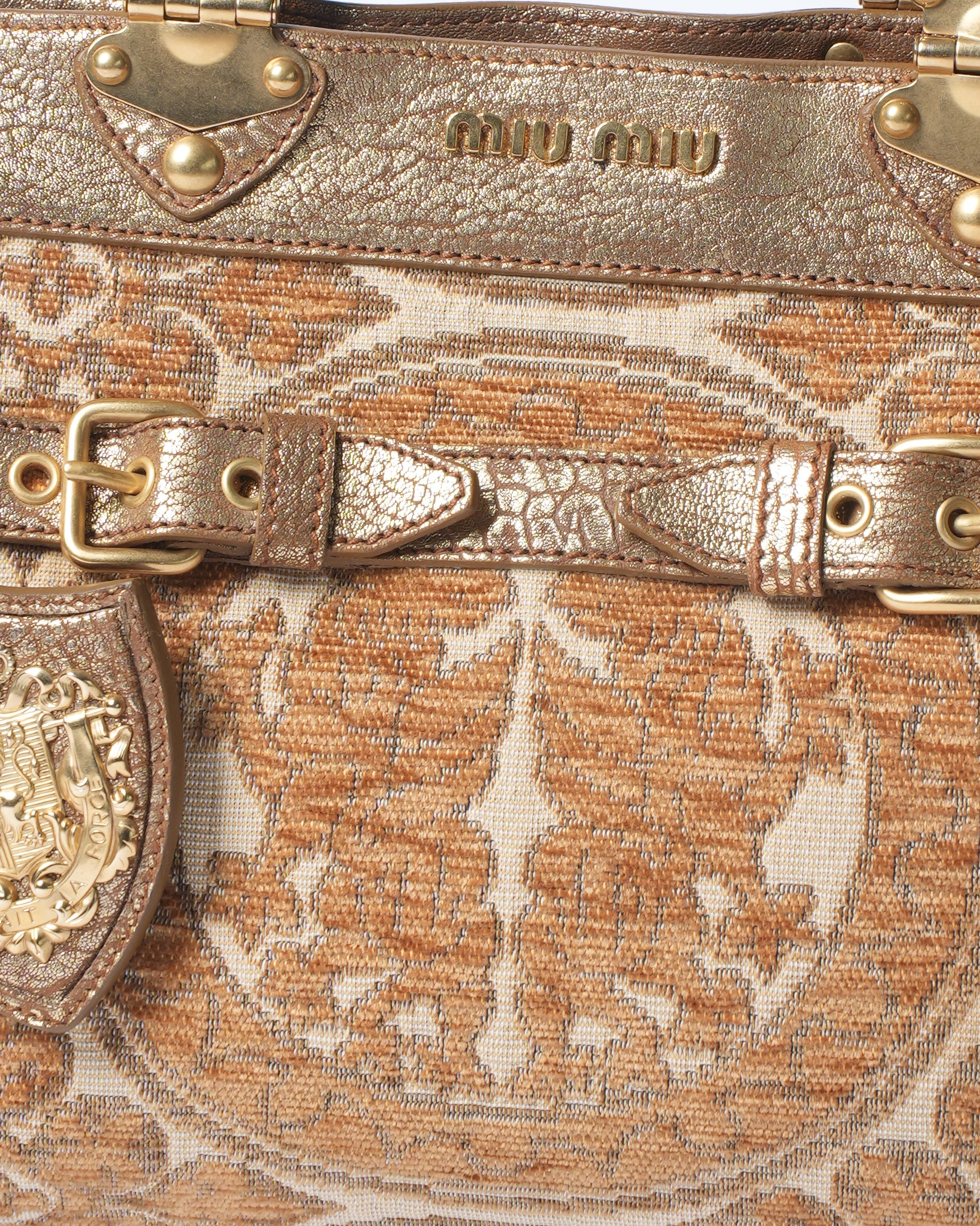 Miu Miu golden bag