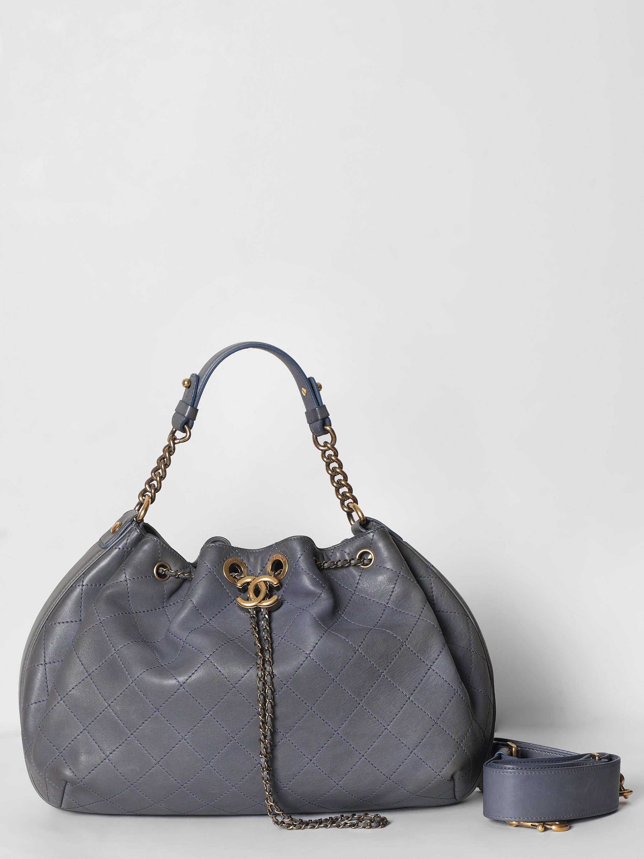 Chanel Paris In Rome Drawstring Quilted Bag In Lambskin