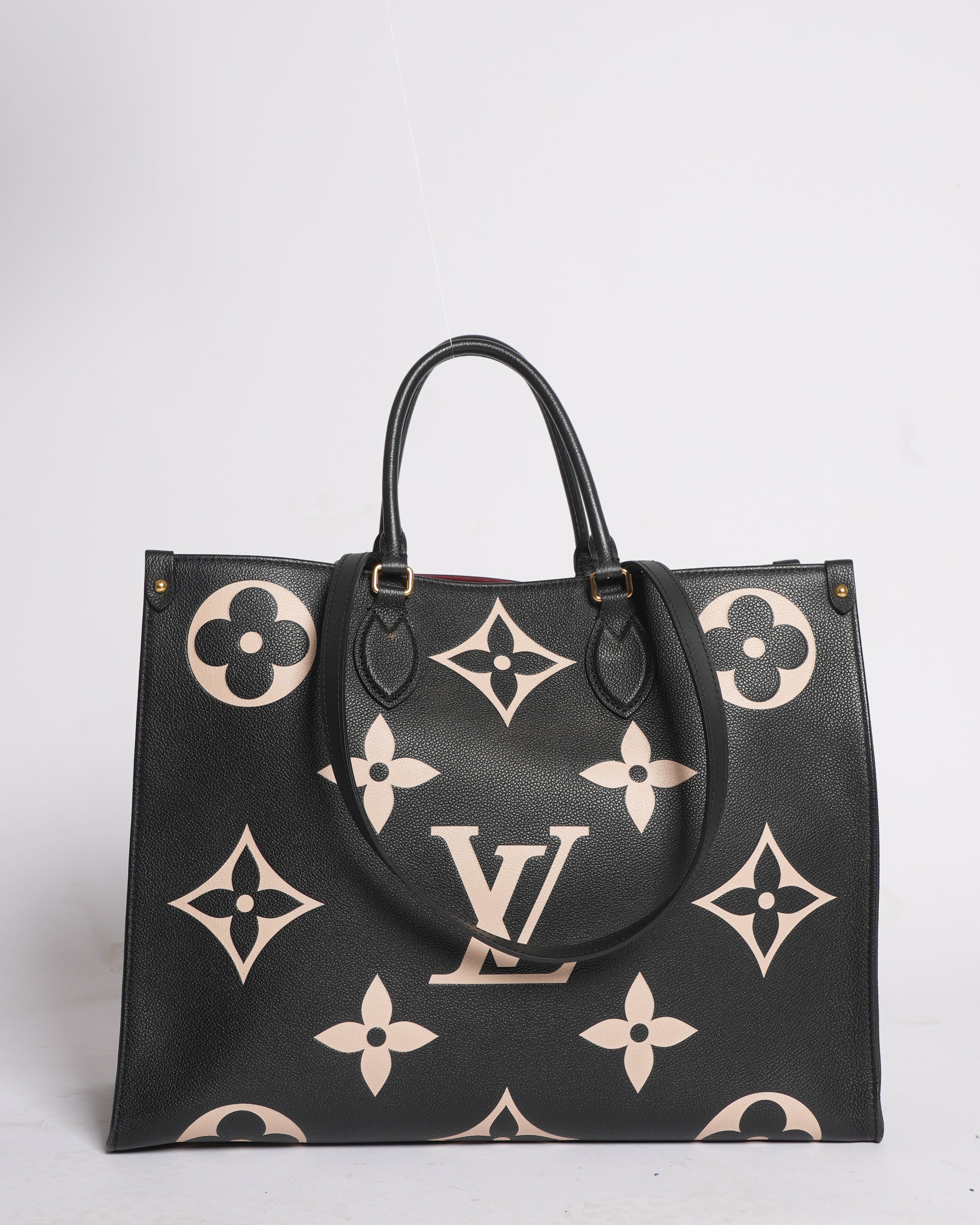 LV On The Go GM Bicolor Monogram Empreint Leather Bag