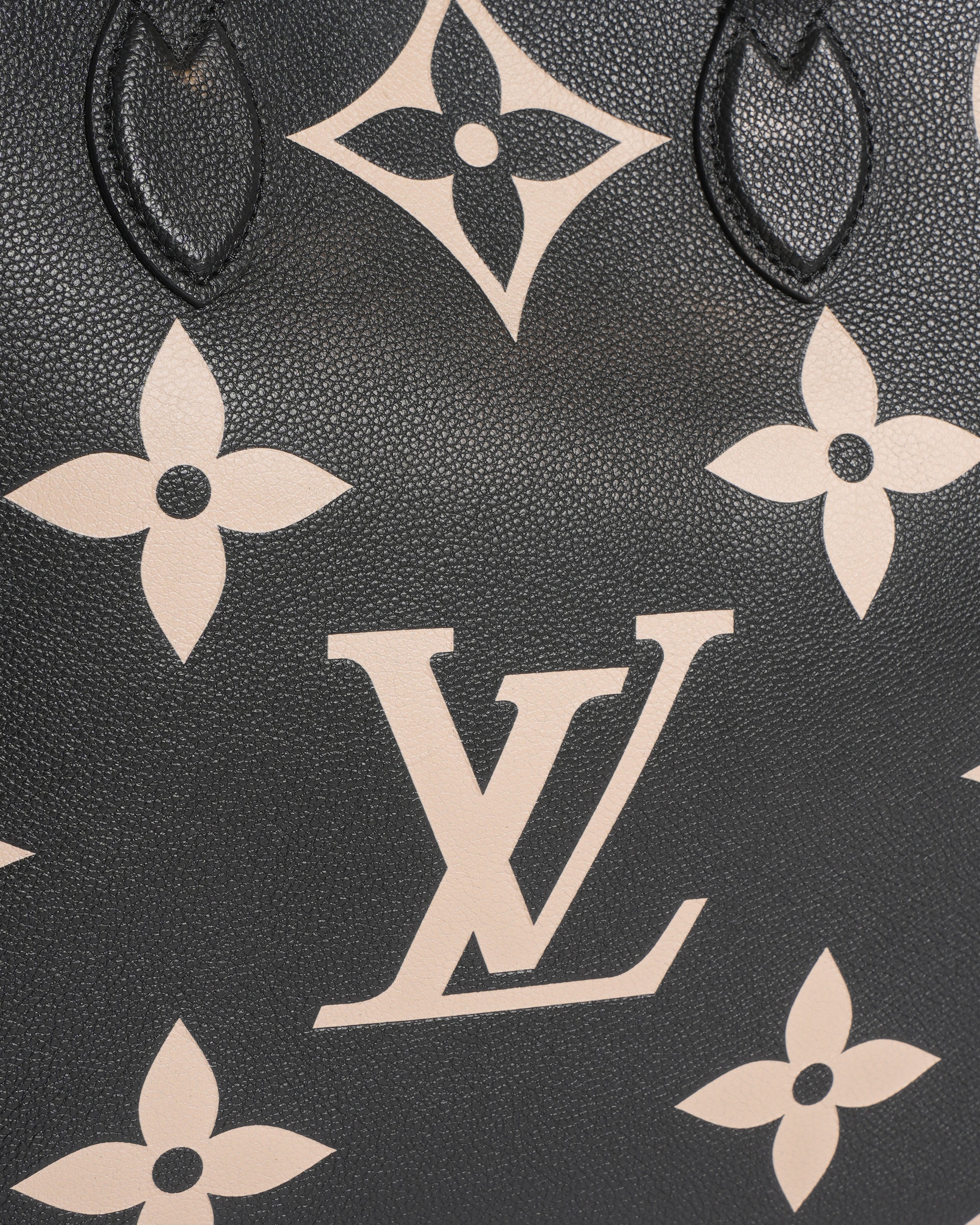 LV On The Go GM Bicolor Monogram Empreint Leather Bag