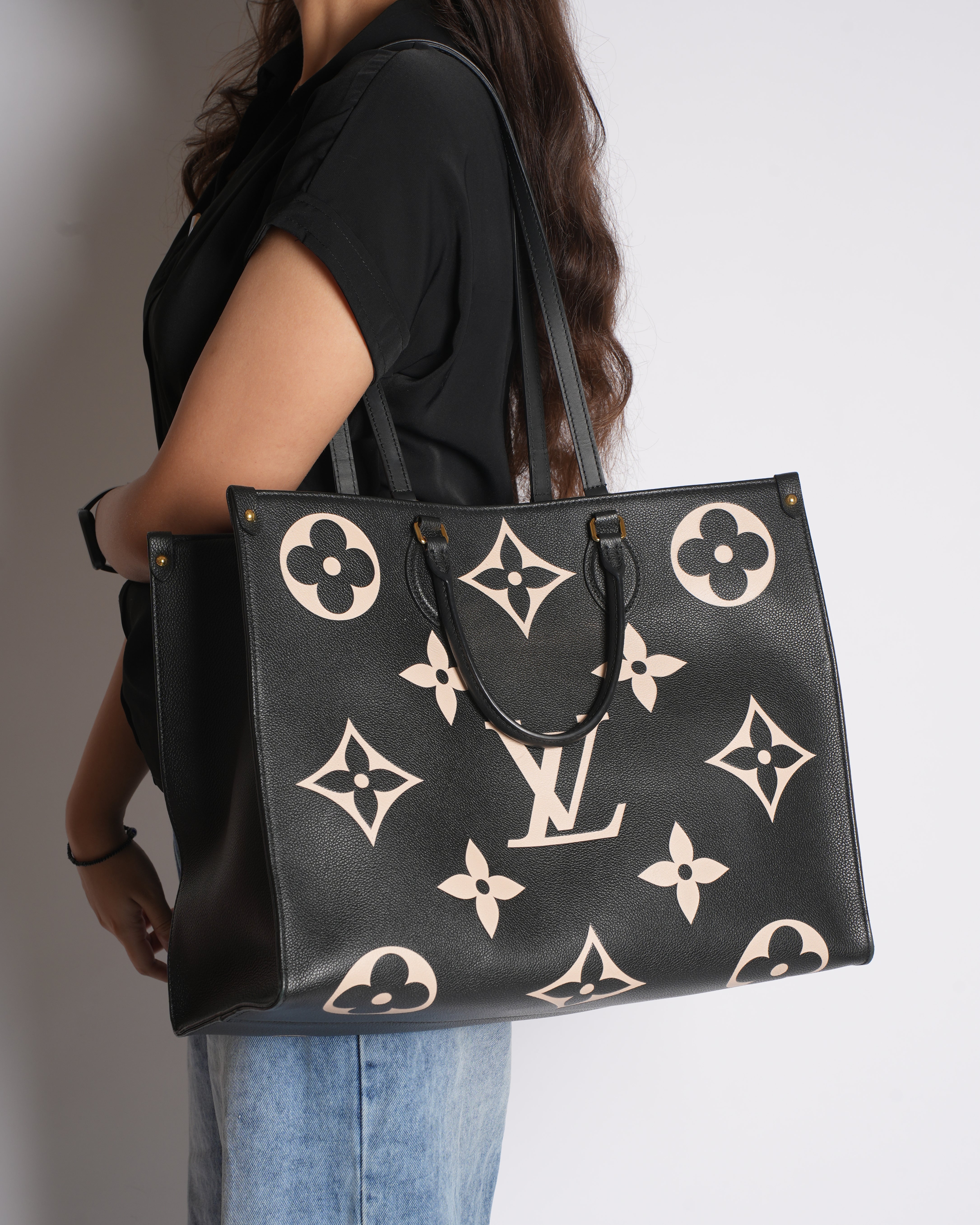 LV On The Go GM Bicolor Monogram Empreint Leather Bag