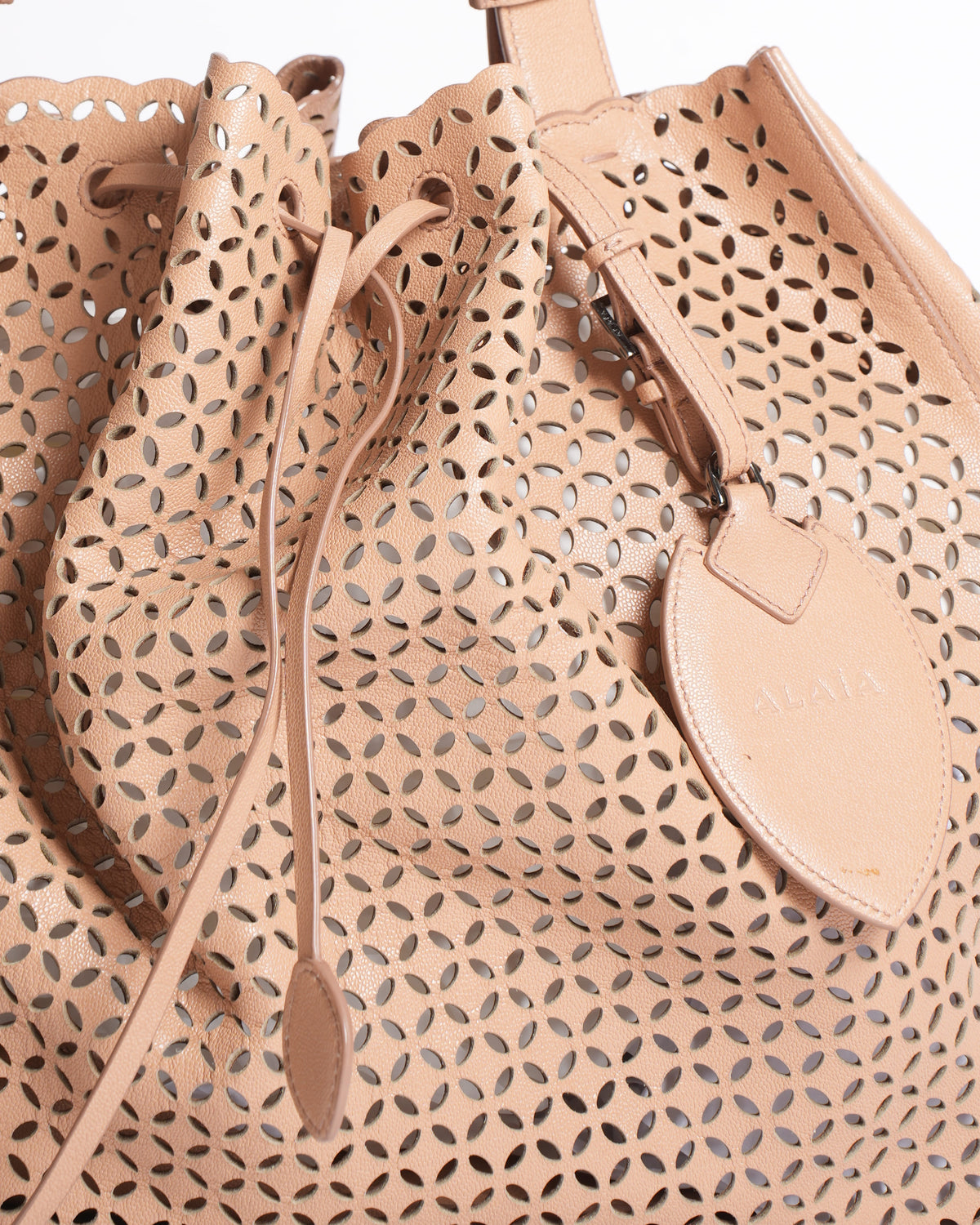 Alaïa Medium Perforated Leather Drawstring Bucket Bag