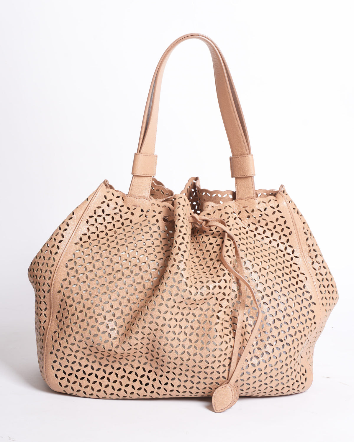Alaïa Medium Perforated Leather Drawstring Bucket Bag
