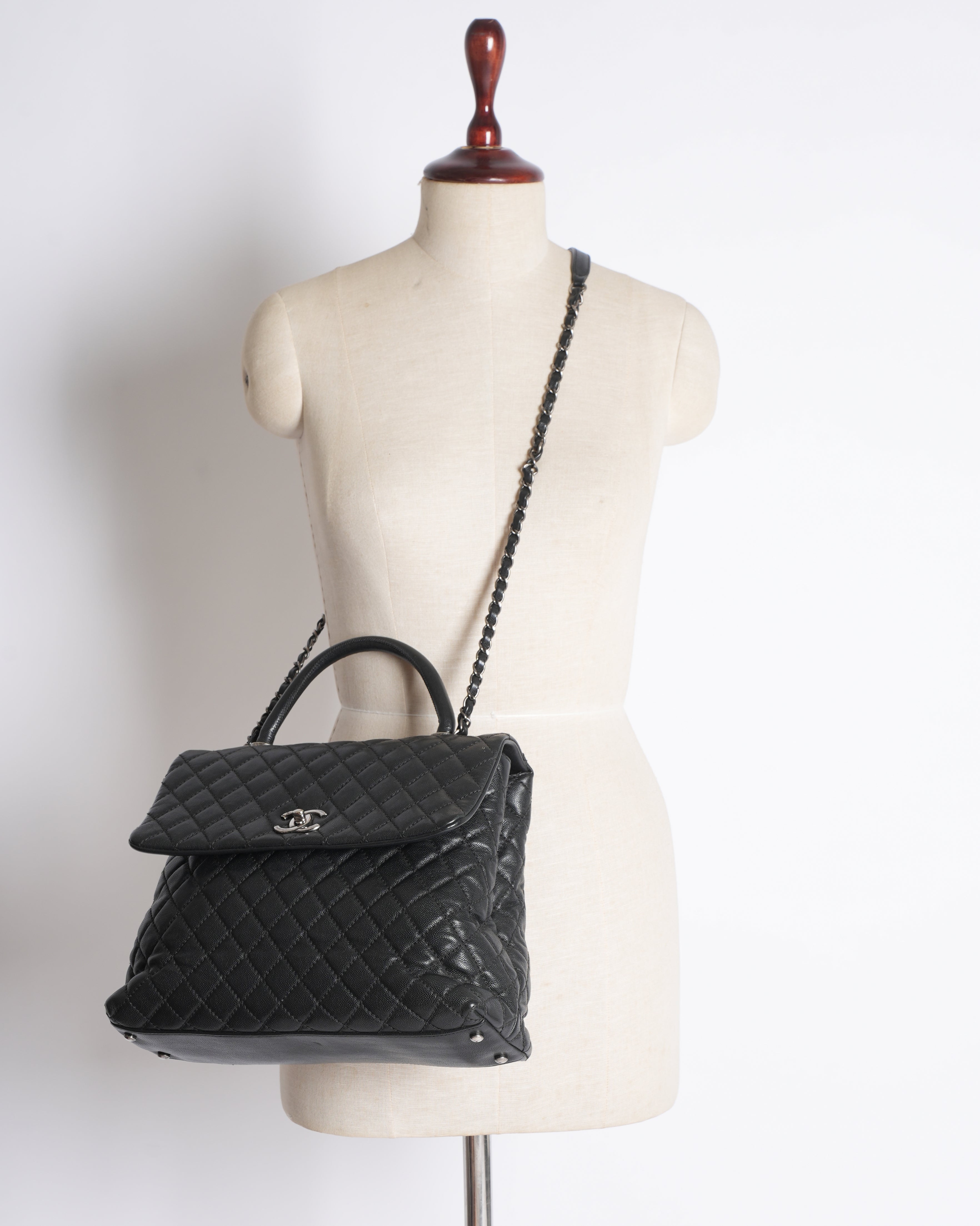 Chanel Quilted Caviar Coco Handle Bag in Black