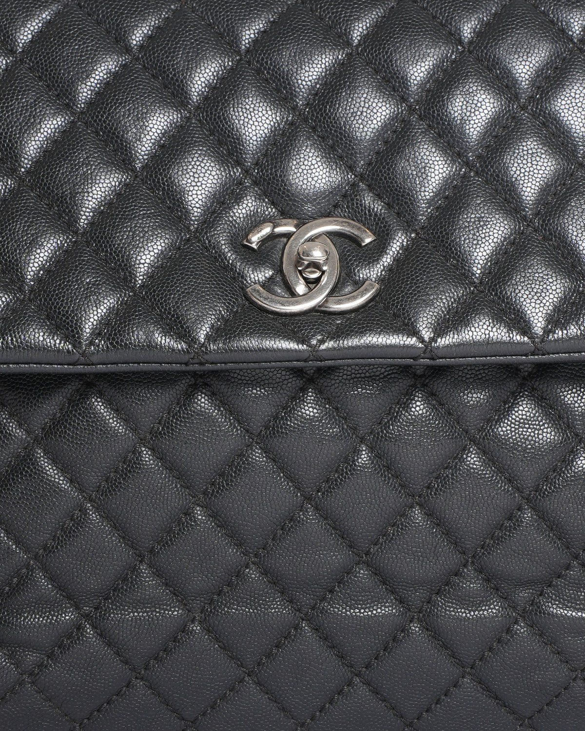Chanel Quilted Caviar Coco Handle Bag in Black