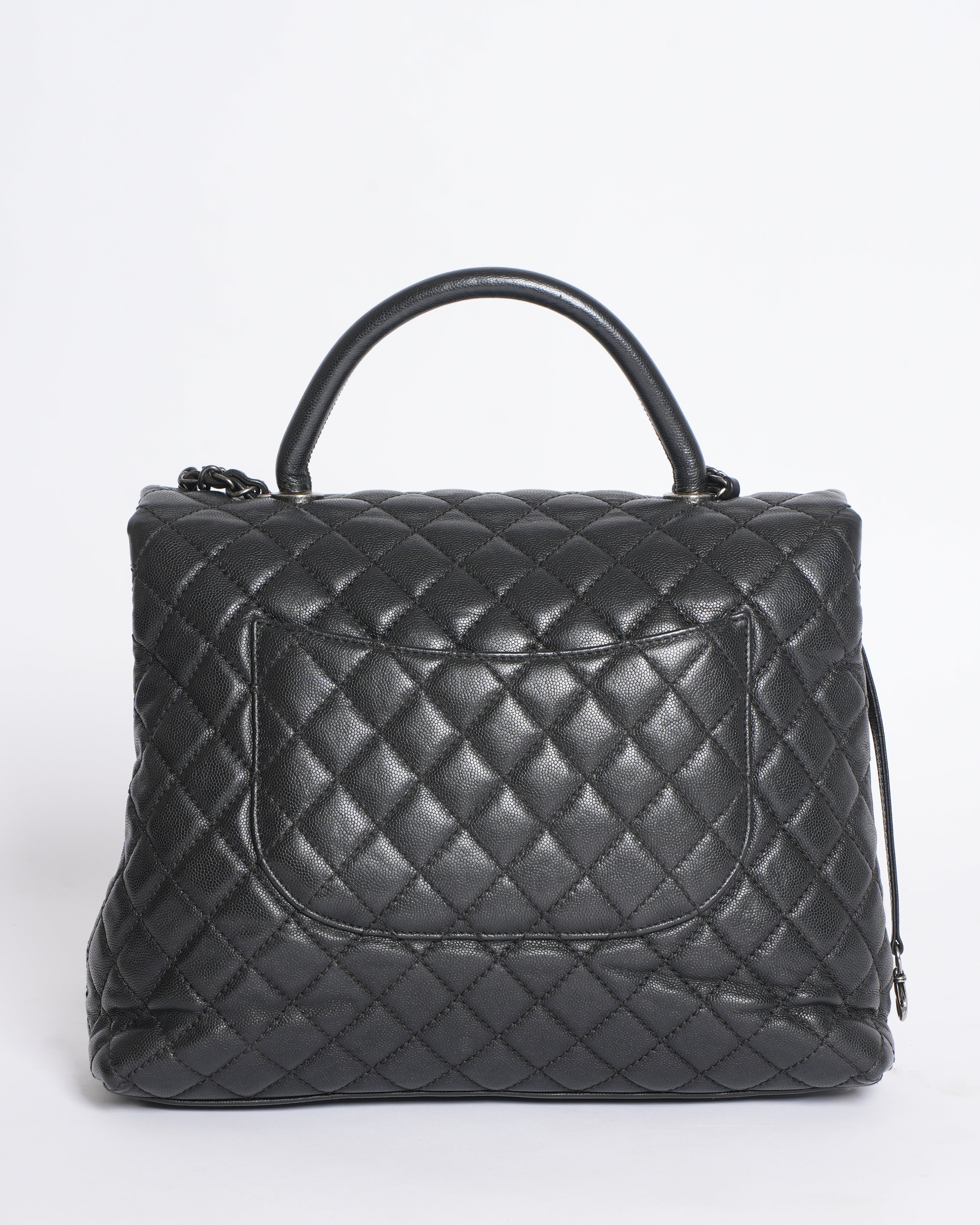 Chanel Quilted Caviar Coco Handle Bag in Black