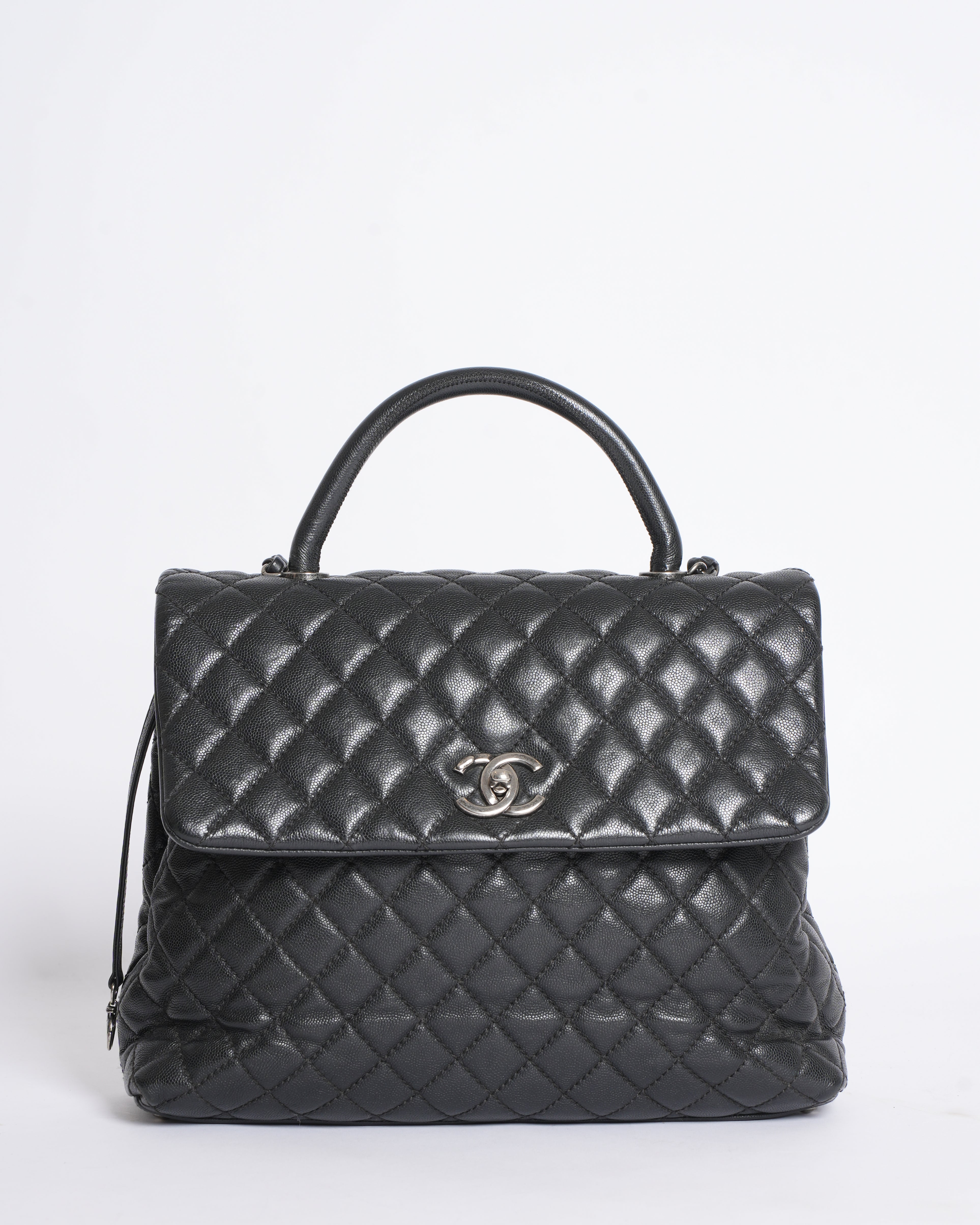Chanel Quilted Caviar Coco Handle Bag in Black