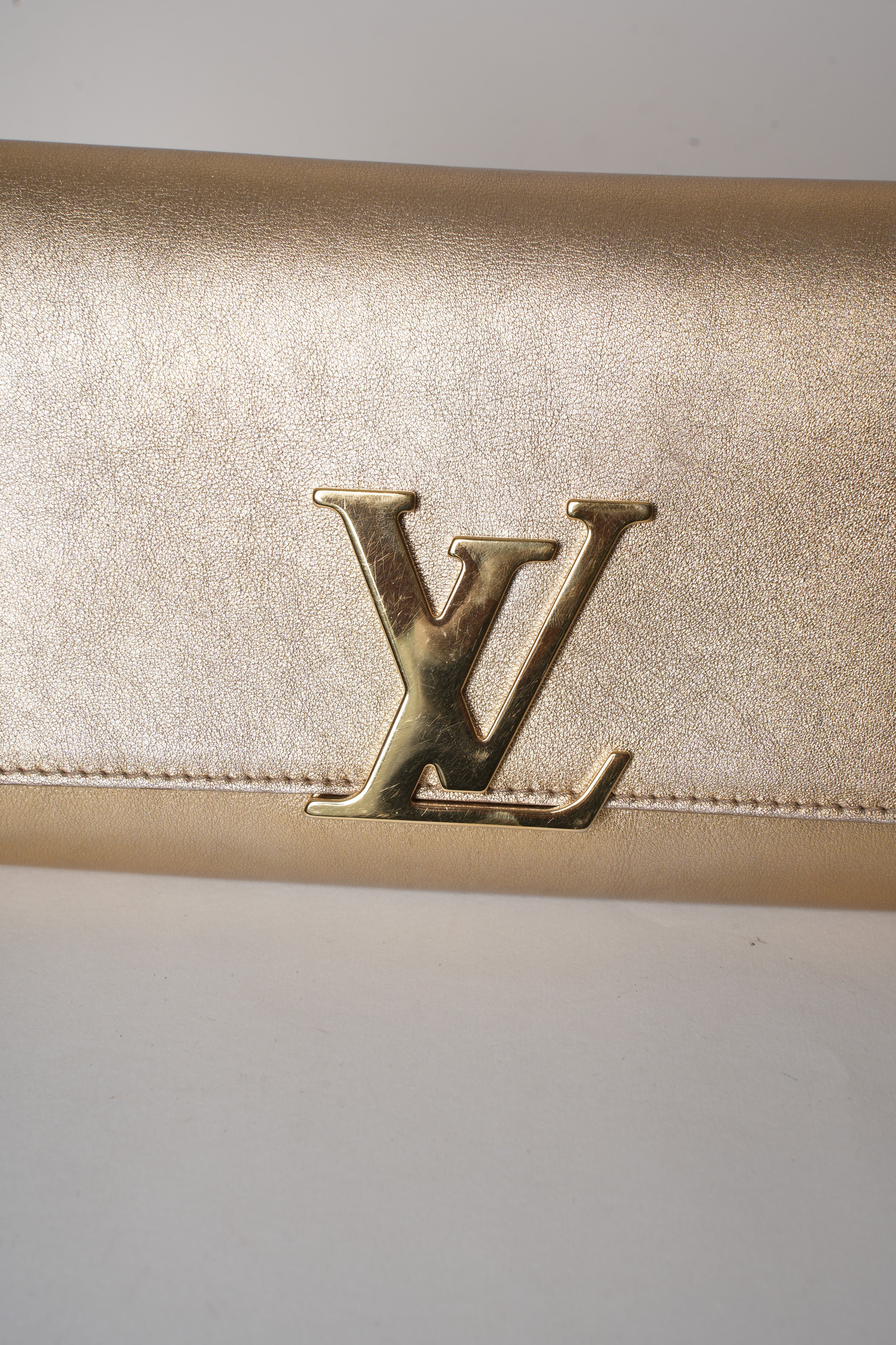 Lv gold clutch online