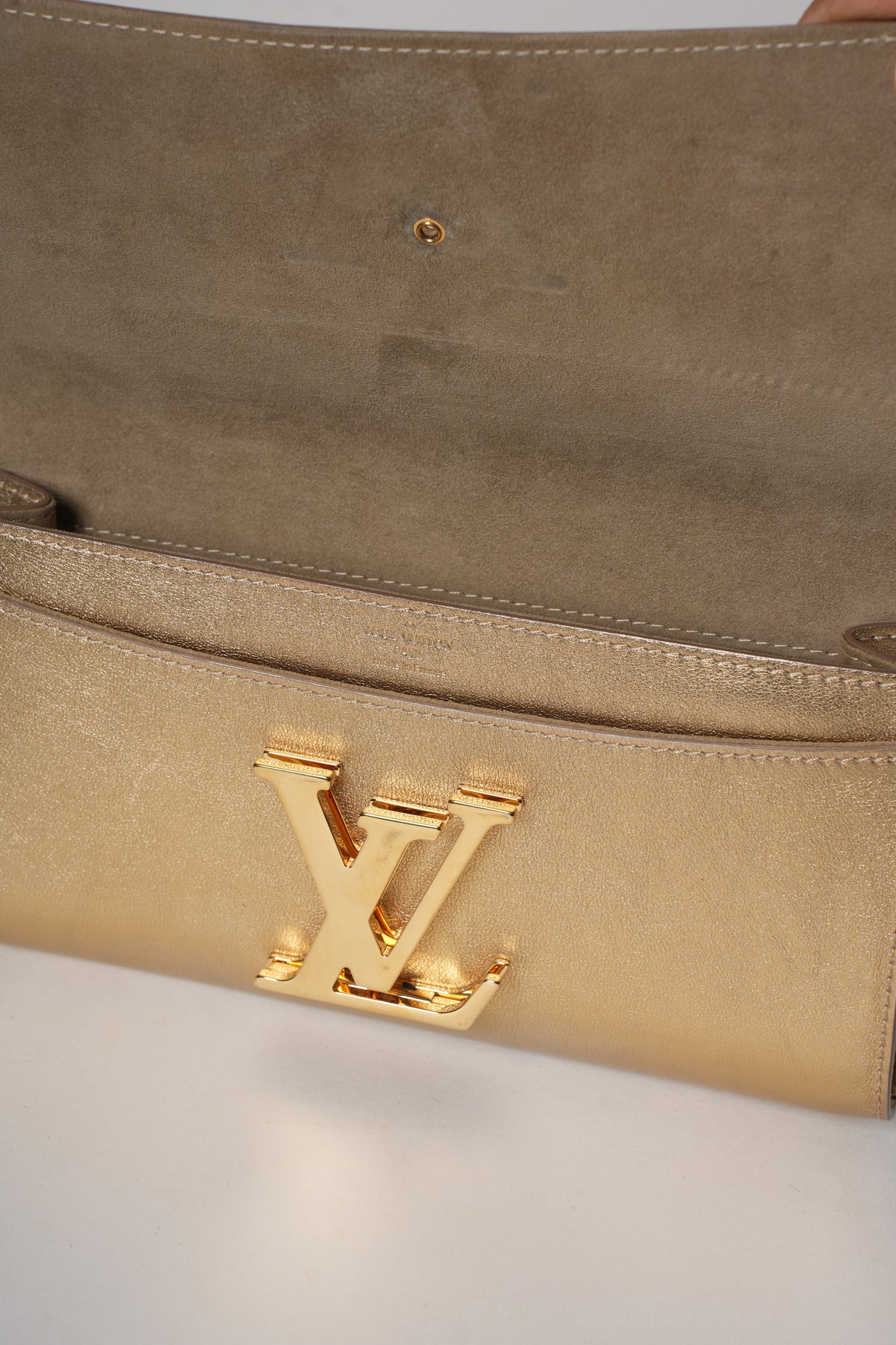 Louis Vuitton Calfskin Neo Louise Clutch