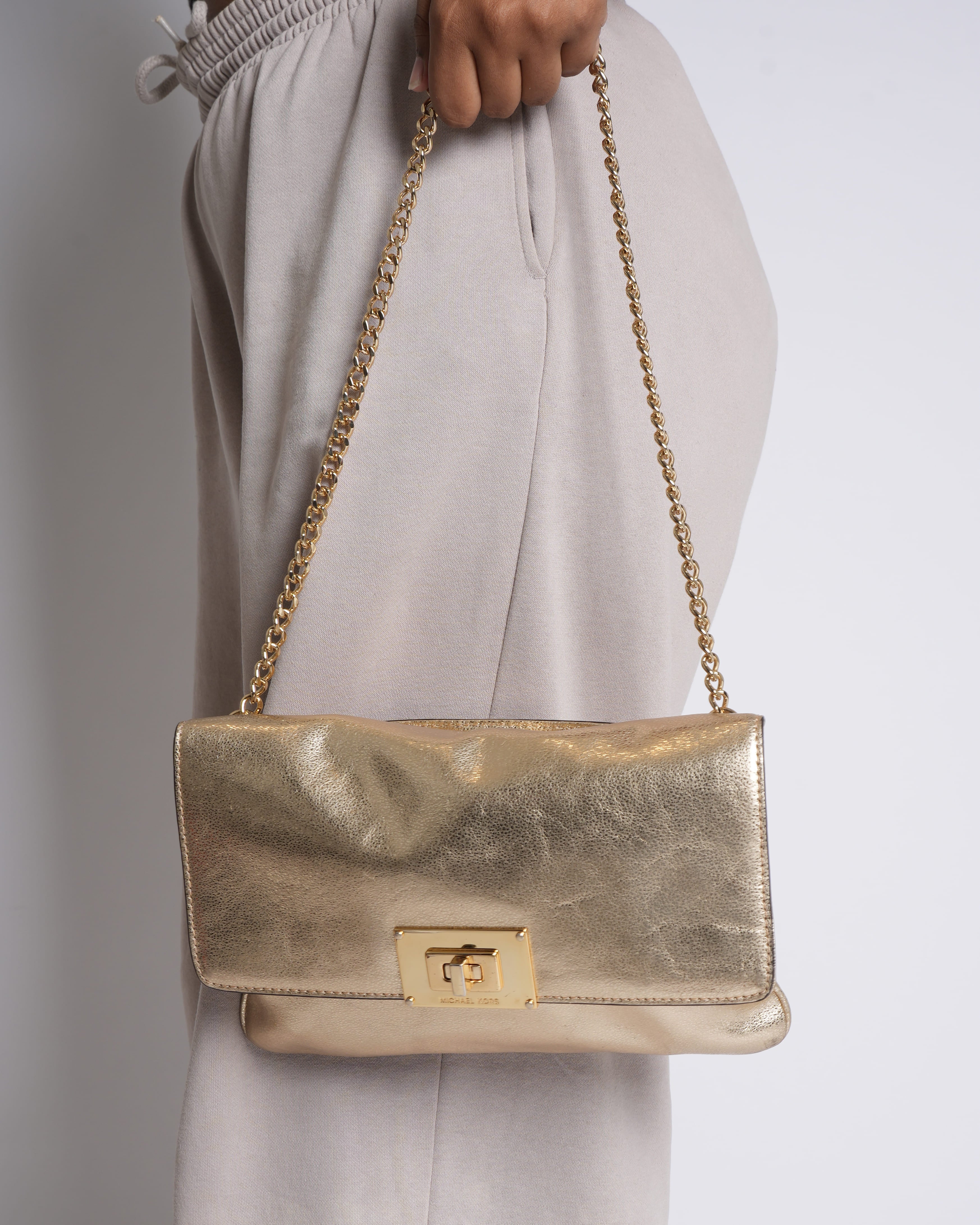 Michael Kors Twist Wallet in Gold Tone