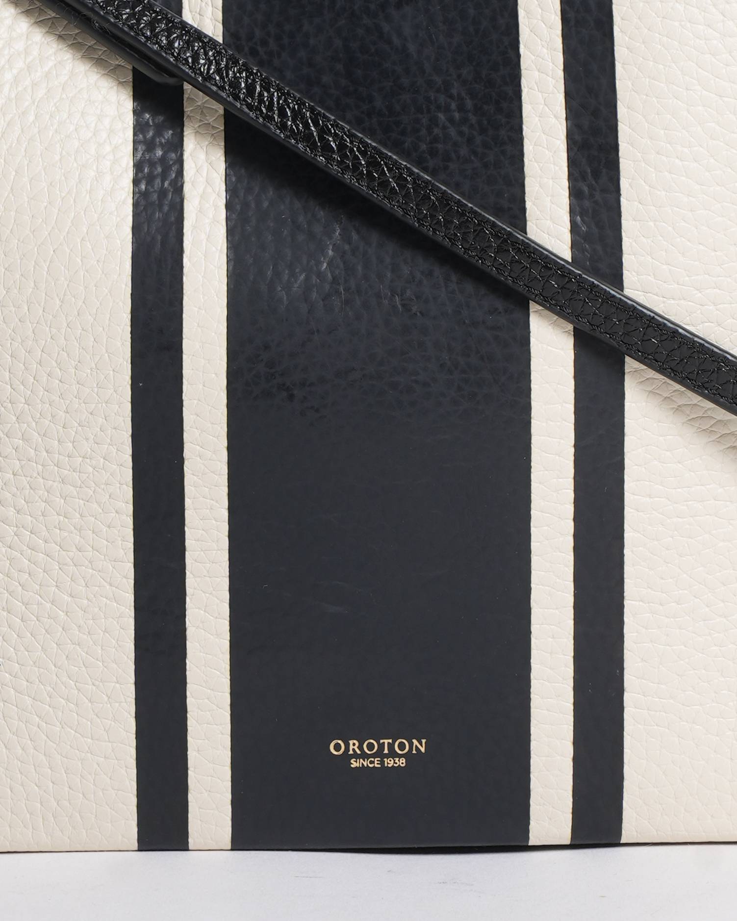 New Oroton
Striped Leather Crossbody Bag