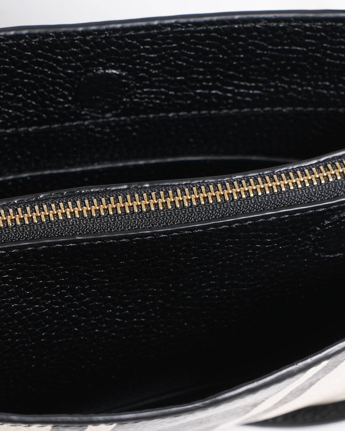 New Oroton
Striped Leather Crossbody Bag