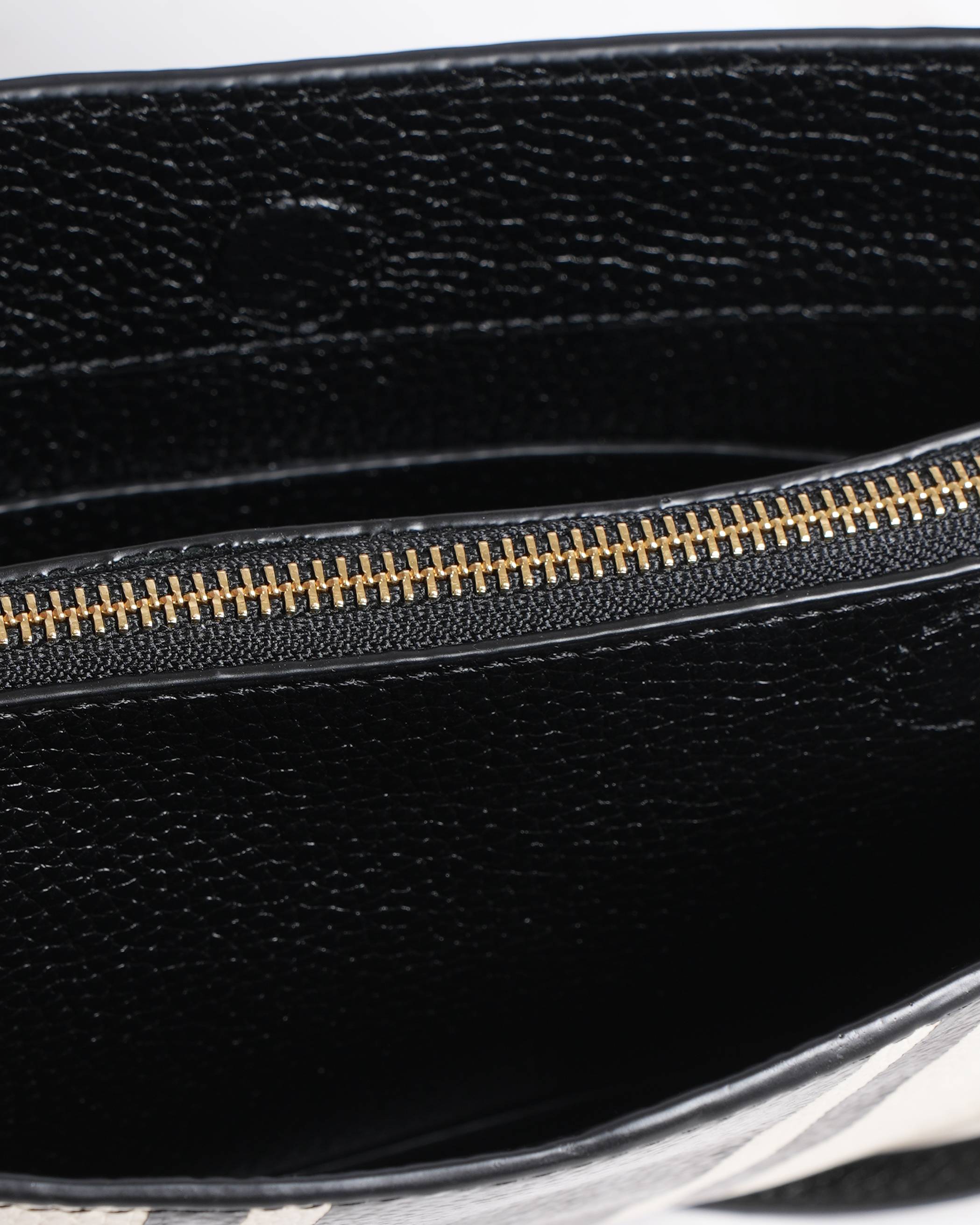 New Oroton
Striped Leather Crossbody Bag