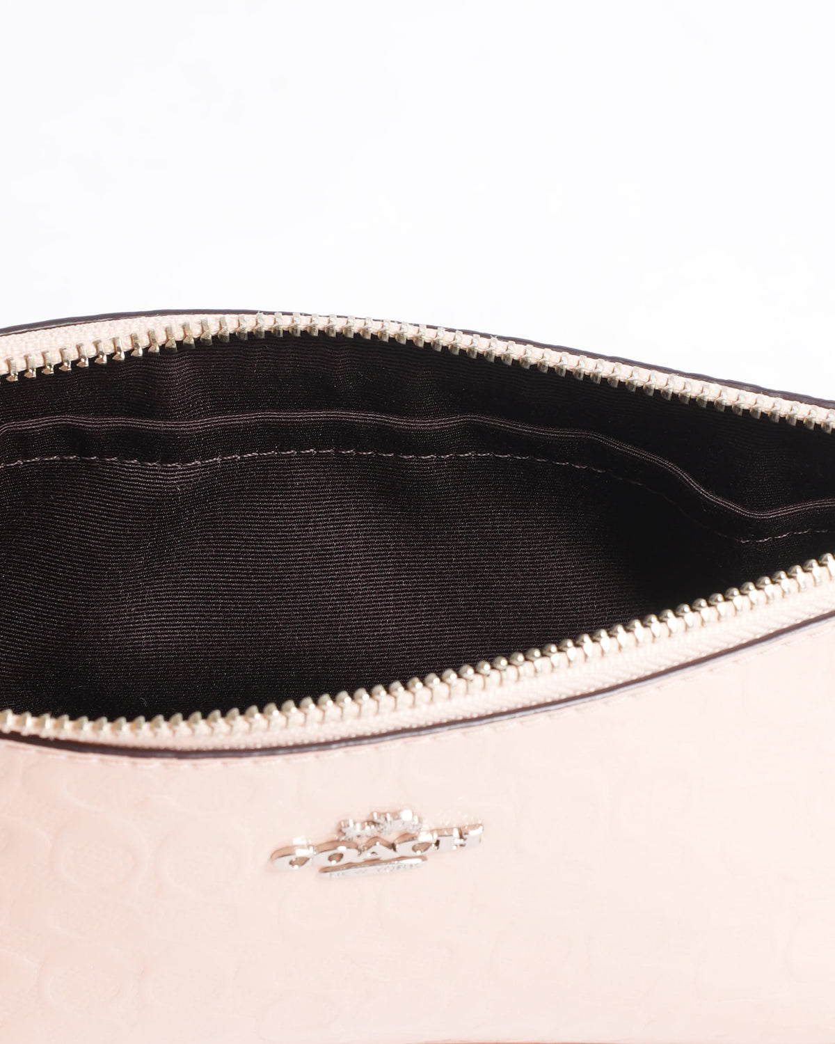 Coach nolita monogram embossed bag