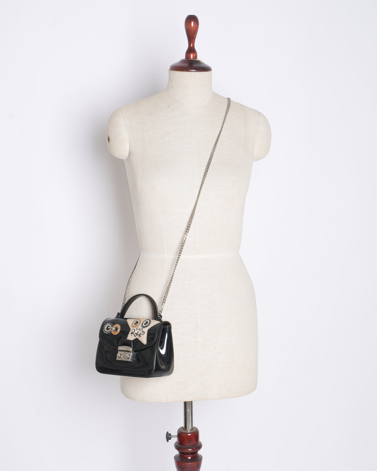 Furla mini metropolis top handle climbing crossbody bag