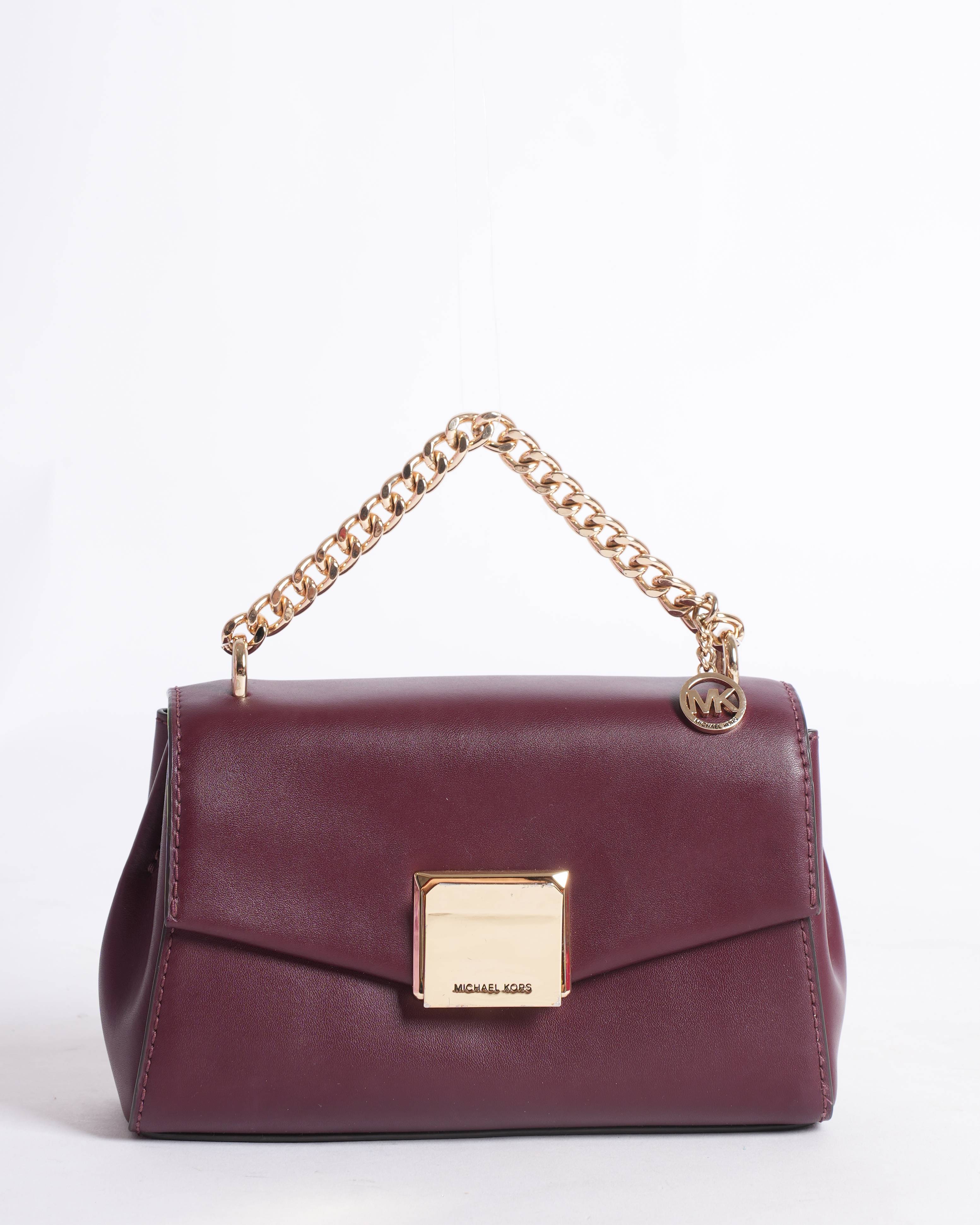 Michael Kors 
Maroon sling bag