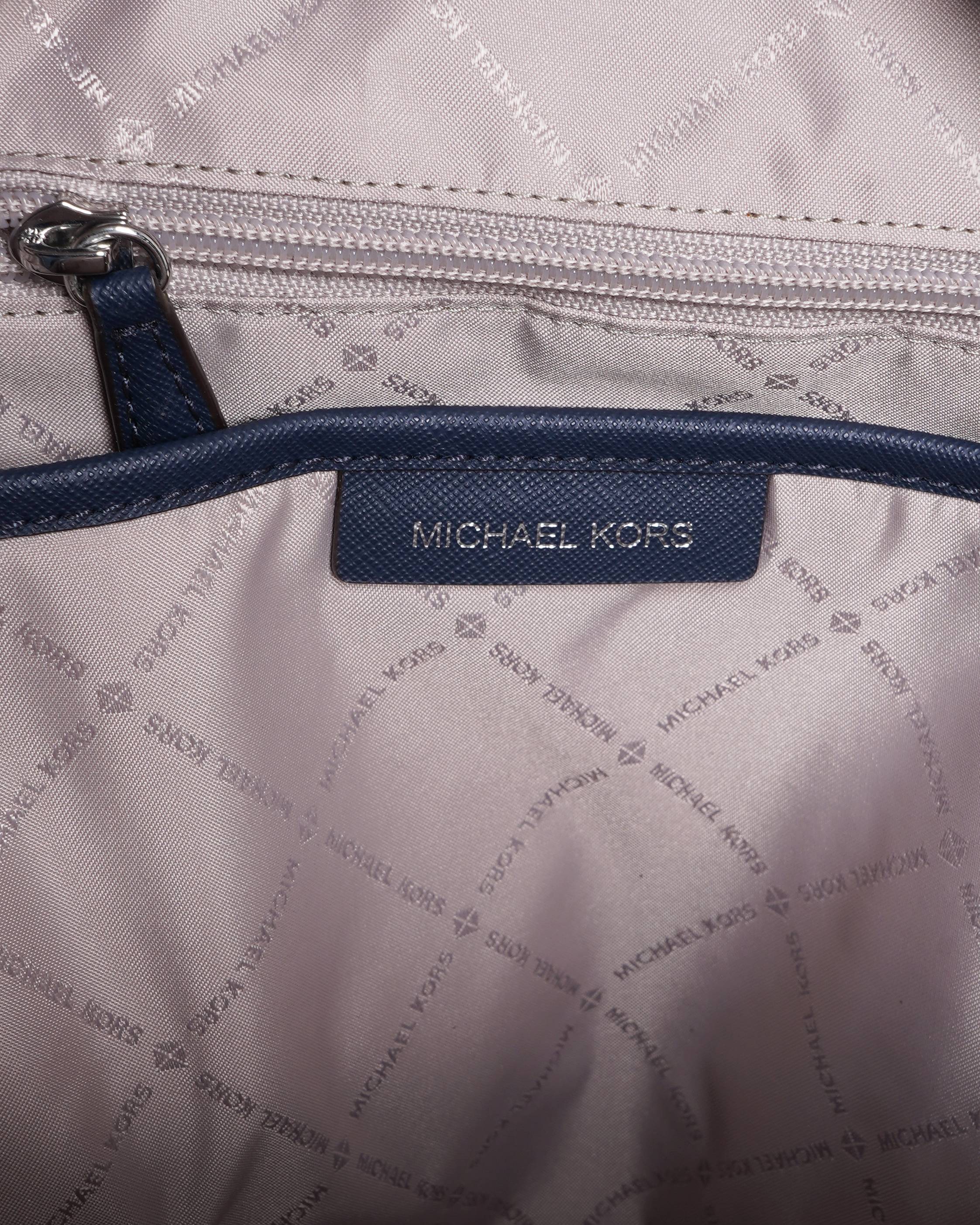 Michael Kors 
Butterfly print backpack in blue