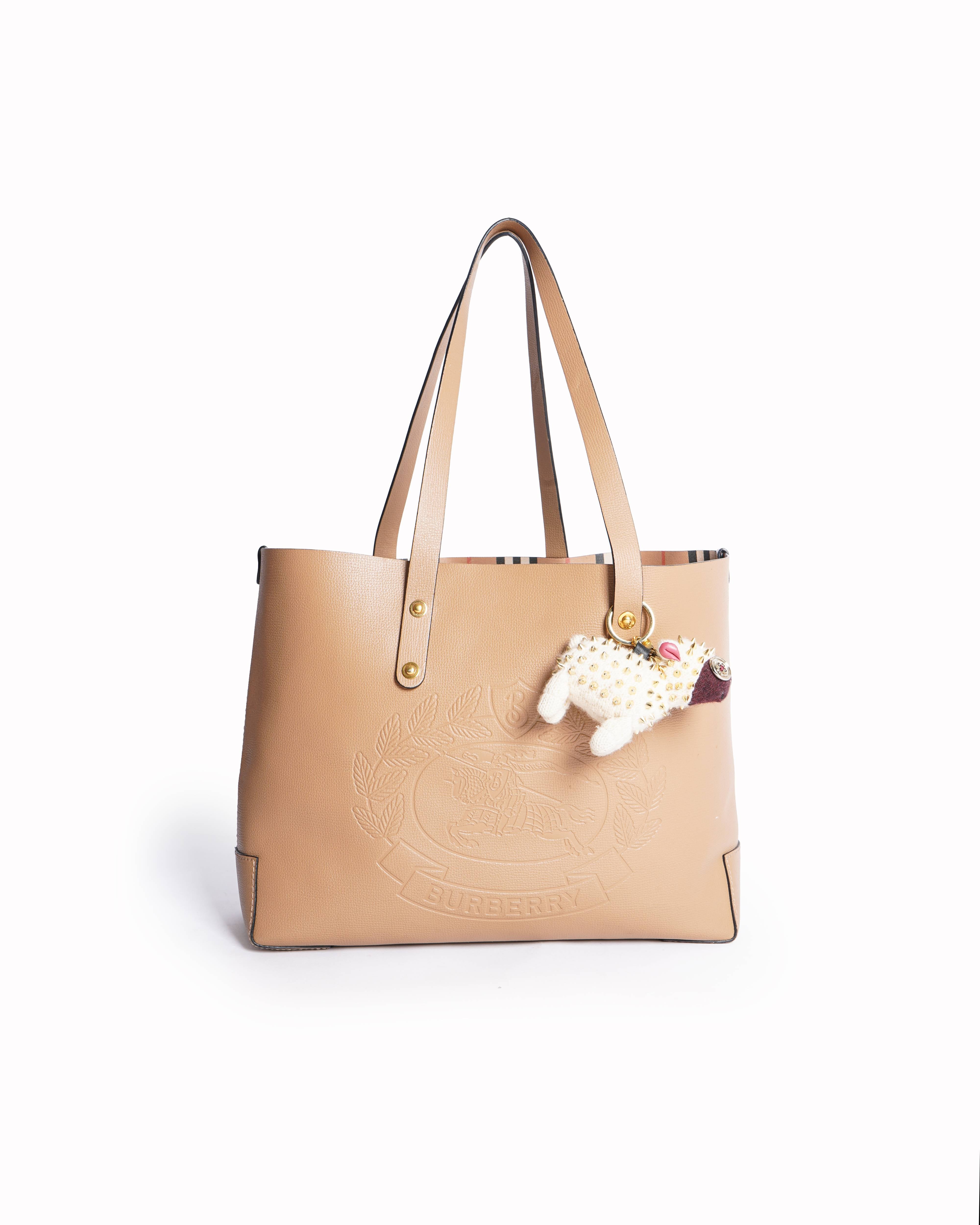 Burberry Crest Embossed beige tote bag