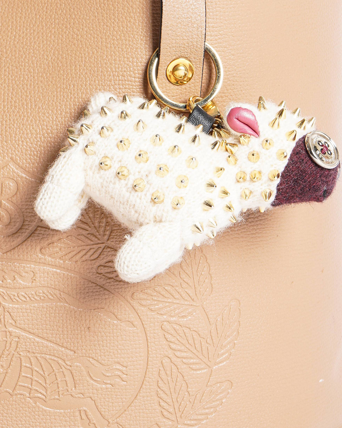 Burberry Crest Embossed beige tote bag